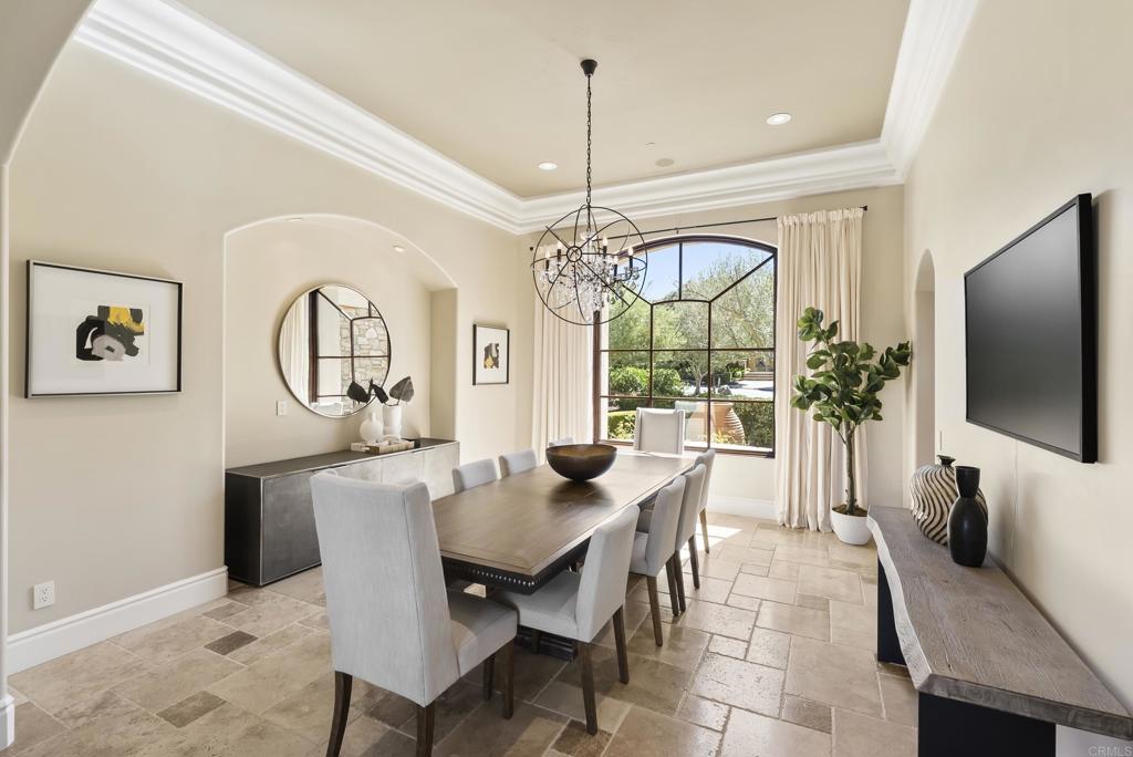 18320 Via Ambiente Rancho Santa Fe, CA 92067 - Photo 9 of 59 a view of a dining room with furniture window and wooden floor