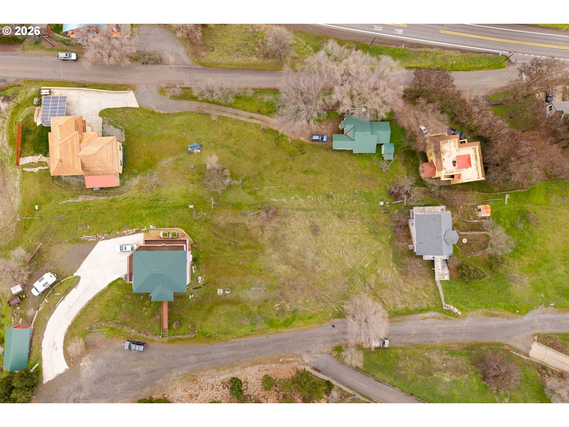 812 Klickitat Street Lyle, WA 98635 - Photo 8 of 13 an aerial view of a house with a swimming pool