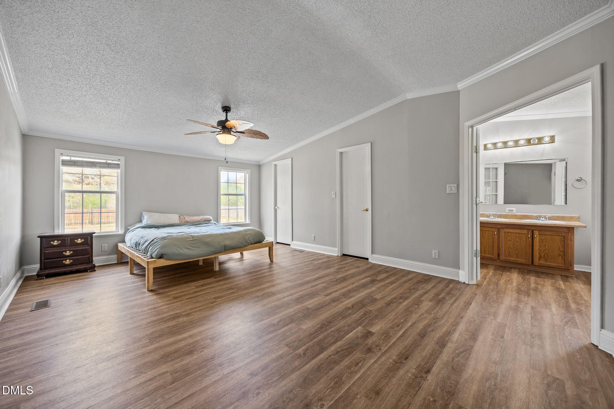 1659 Adcock Road Lillington, NC 27546 - Photo 12 of 34 a living room with a bed and furniture