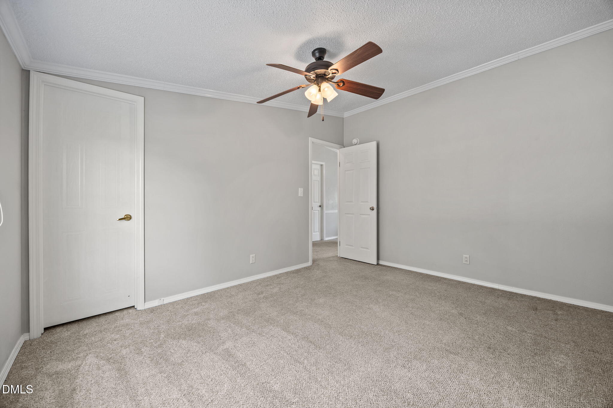 1659 Adcock Road Lillington, NC 27546 - Photo 20 of 34 a view of an empty room and chandelier fan