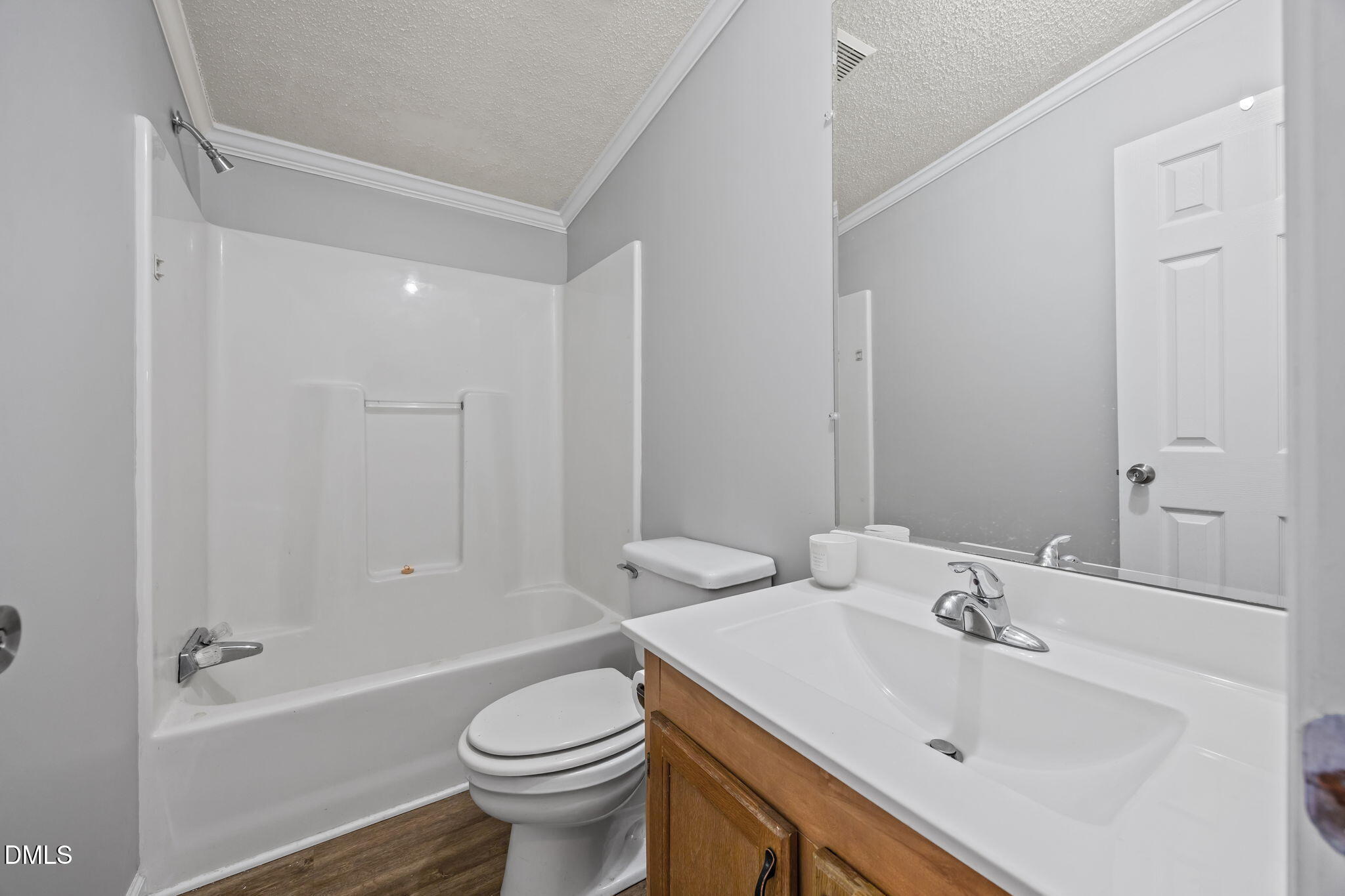 1659 Adcock Road Lillington, NC 27546 - Photo 26 of 34 a bathroom with a sink toilet and shower