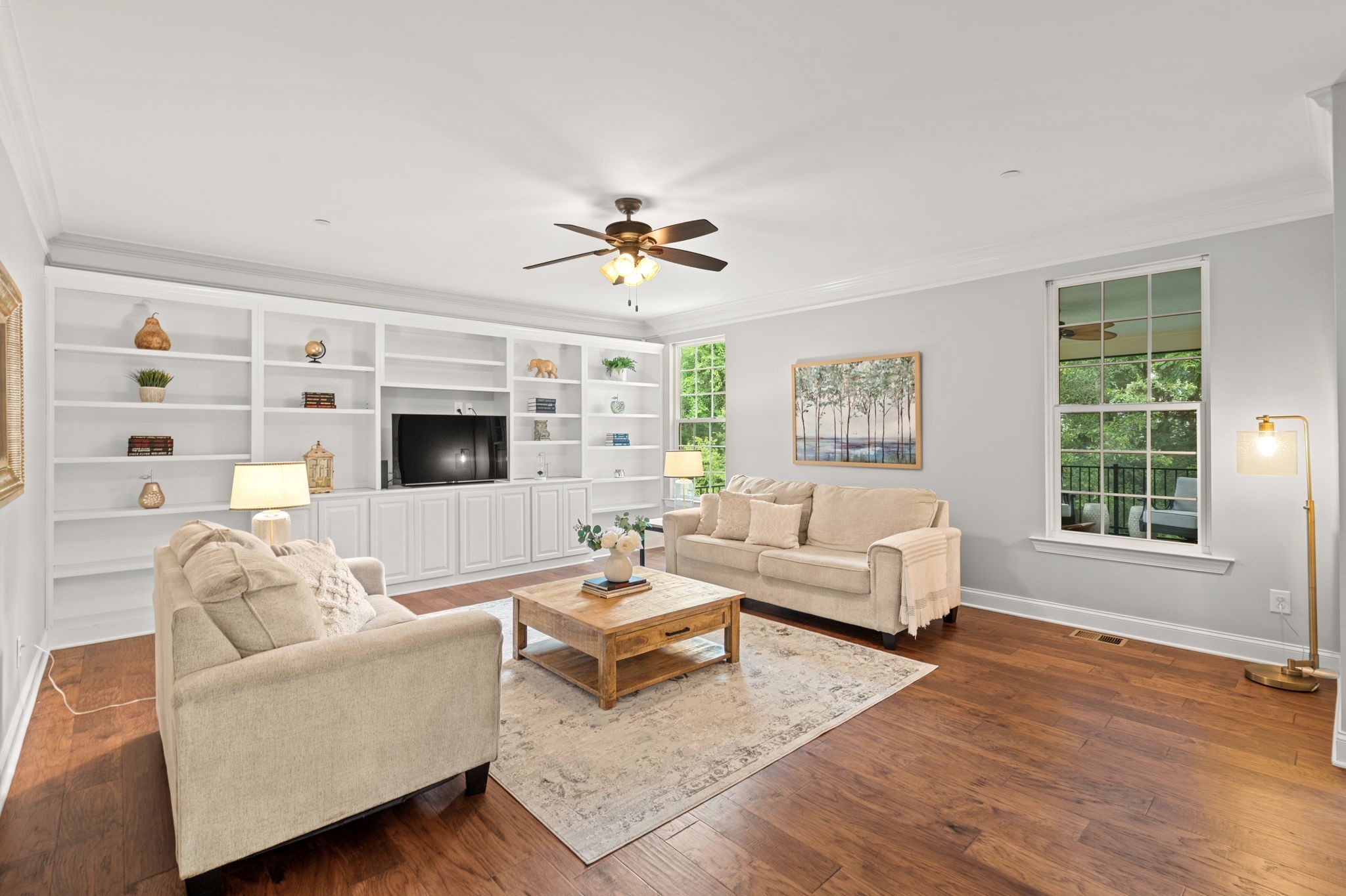 121 Stream Valley Boulevard Franklin, TN 37064 - Photo 11 of 60 a living room with furniture and a flat screen tv