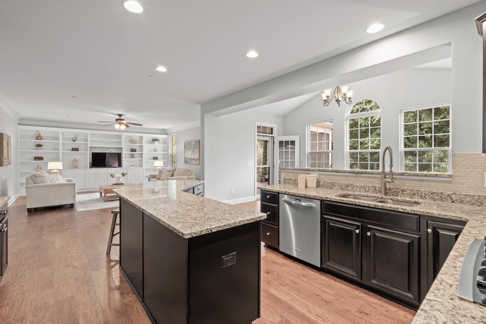 121 Stream Valley Boulevard Franklin, TN 37064 - Photo 13 of 60 a kitchen with stainless steel appliances granite countertop a stove and a sink