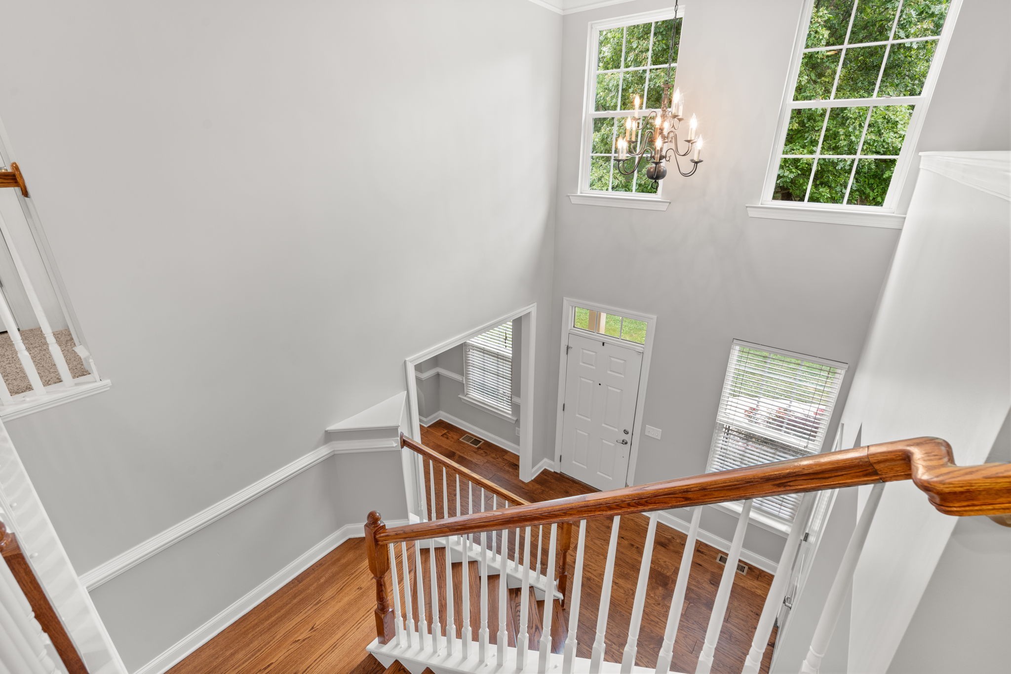 121 Stream Valley Boulevard Franklin, TN 37064 - Photo 22 of 60 a view of staircase with railing and white walls