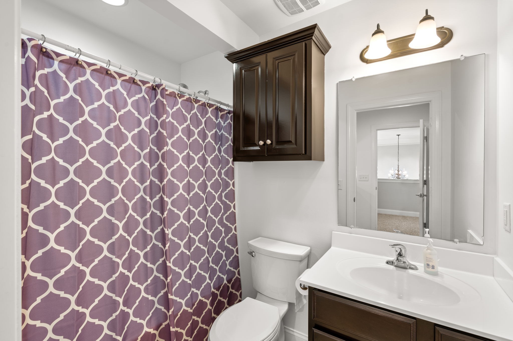 121 Stream Valley Boulevard Franklin, TN 37064 - Photo 30 of 60 a bathroom with a sink and a toilet
