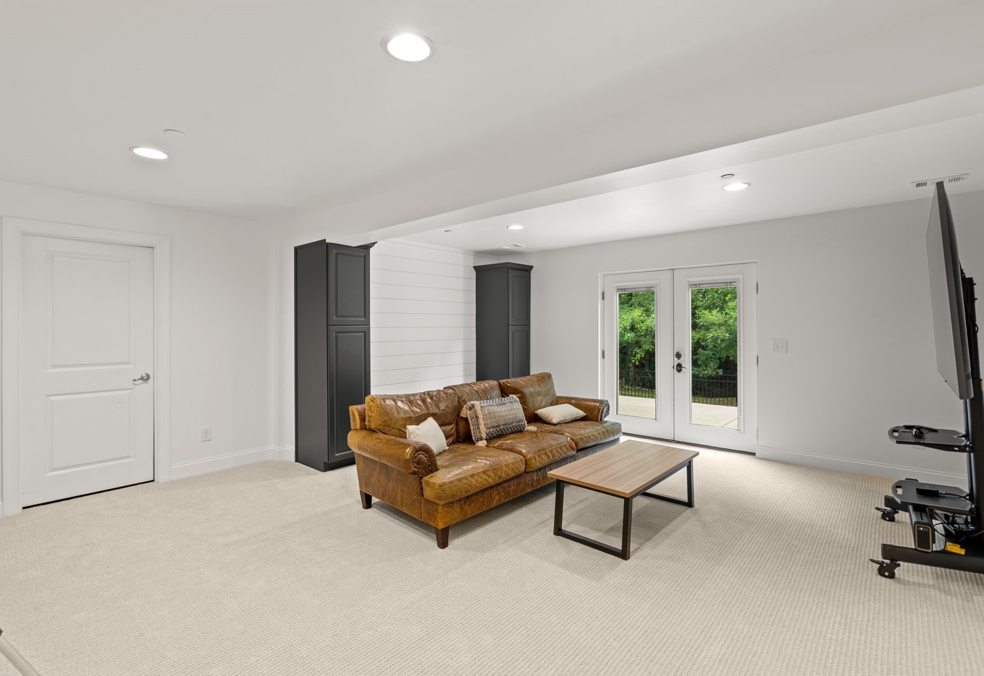 121 Stream Valley Boulevard Franklin, TN 37064 - Photo 34 of 60 a living room with furniture and a flat screen tv