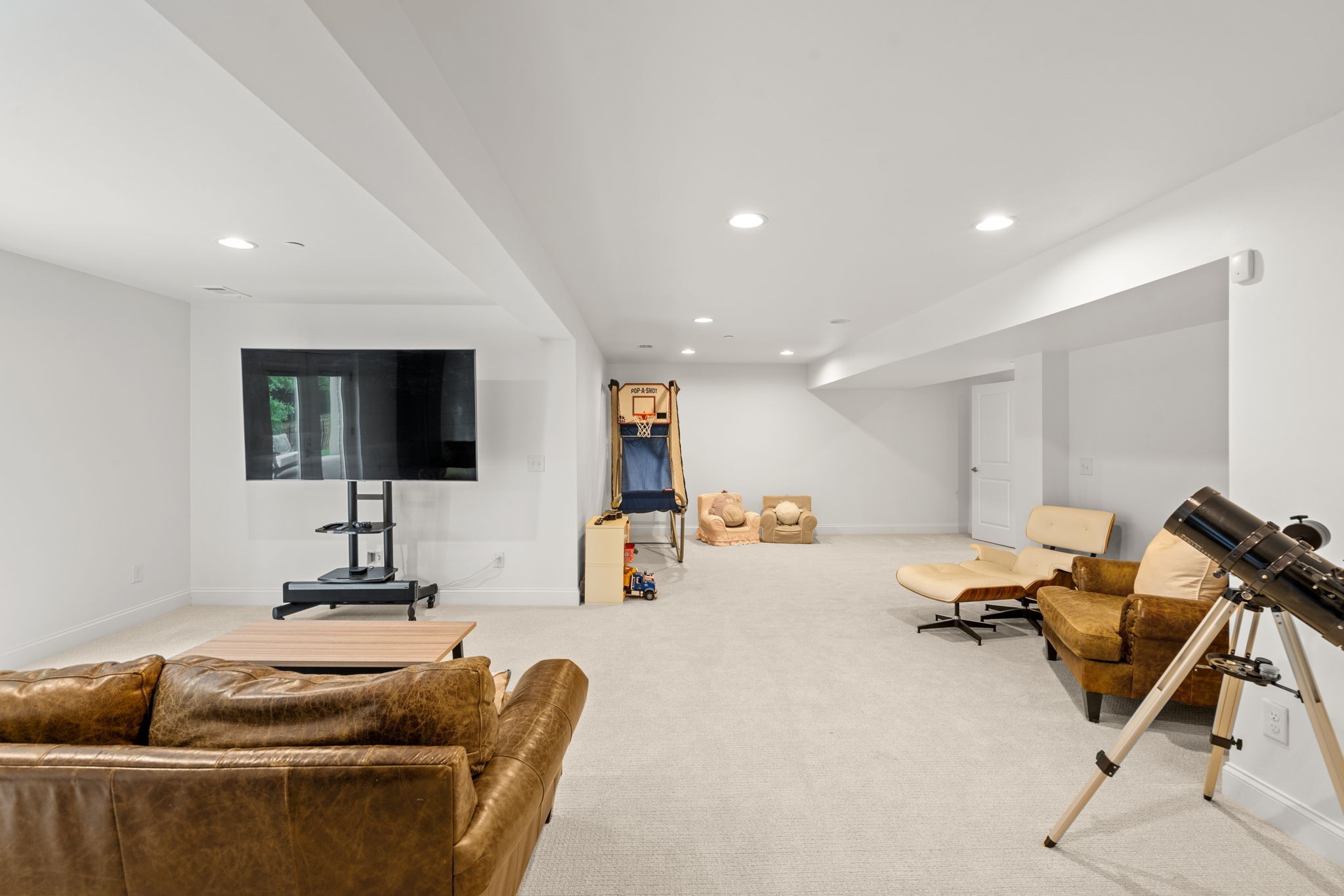 121 Stream Valley Boulevard Franklin, TN 37064 - Photo 35 of 60 a living room with furniture and a flat screen tv