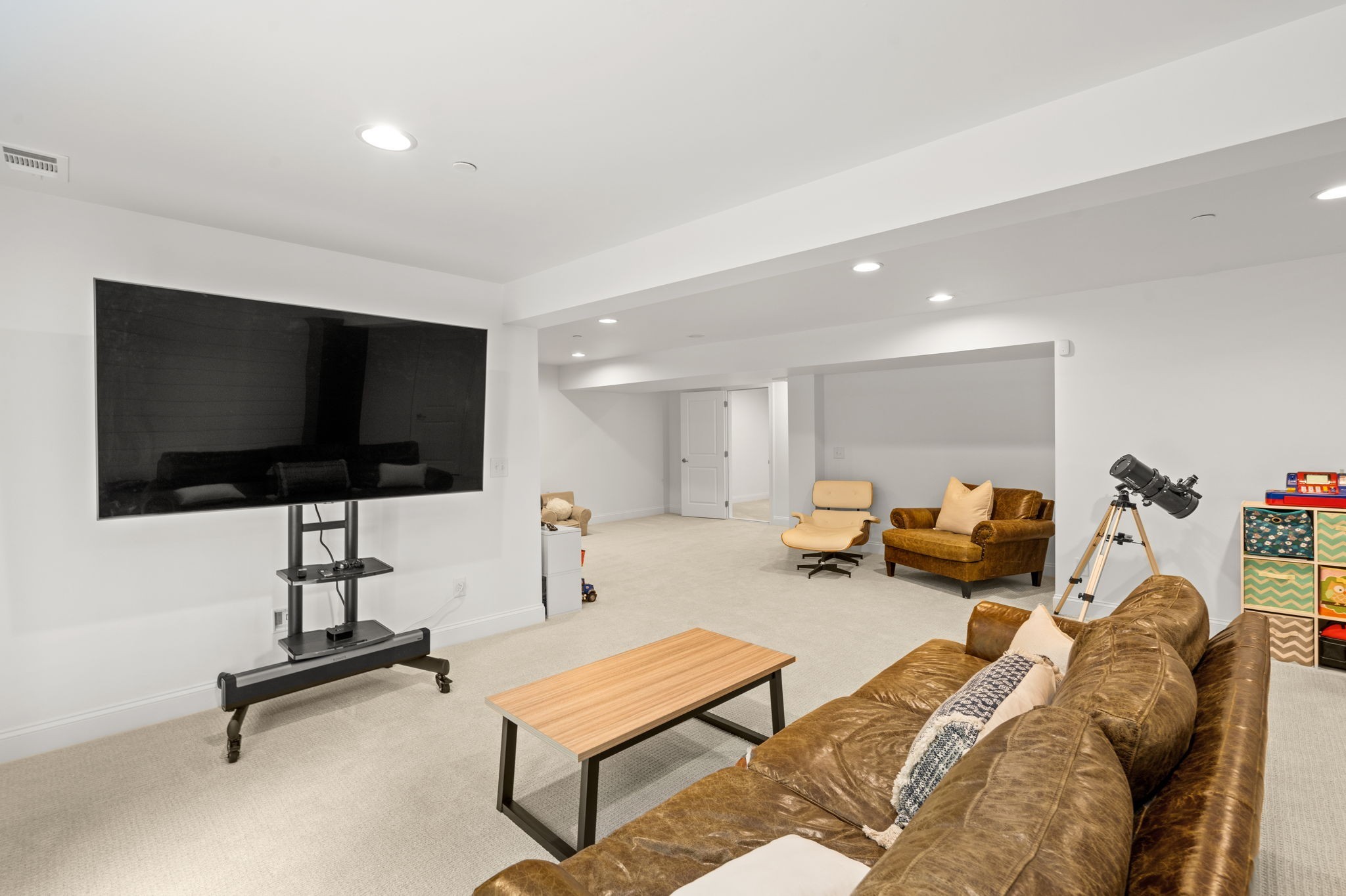 121 Stream Valley Boulevard Franklin, TN 37064 - Photo 36 of 60 a living room with furniture and a flat screen tv