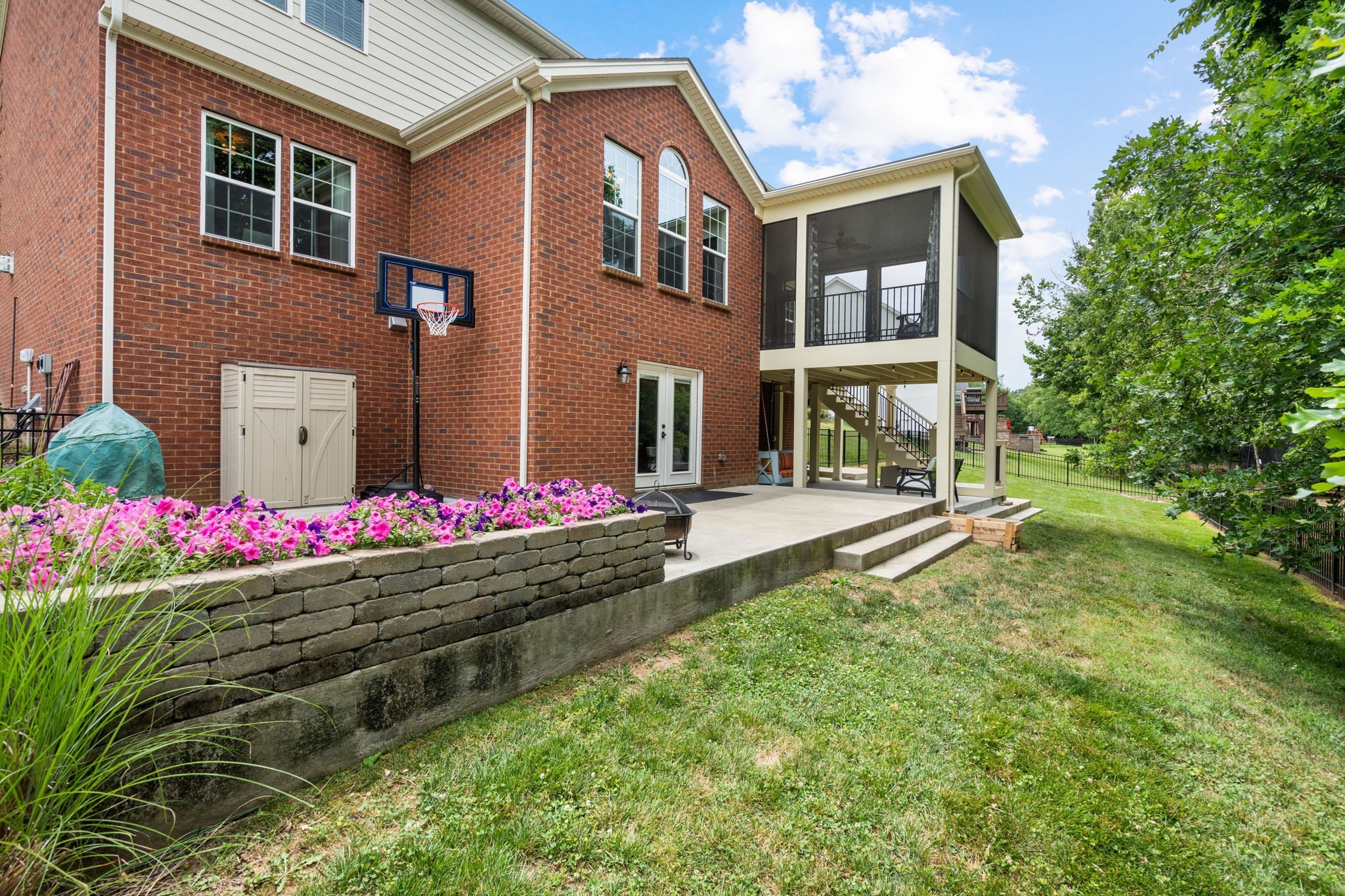 121 Stream Valley Boulevard Franklin, TN 37064 - Photo 45 of 60 a view of a house with a yard and potted plants
