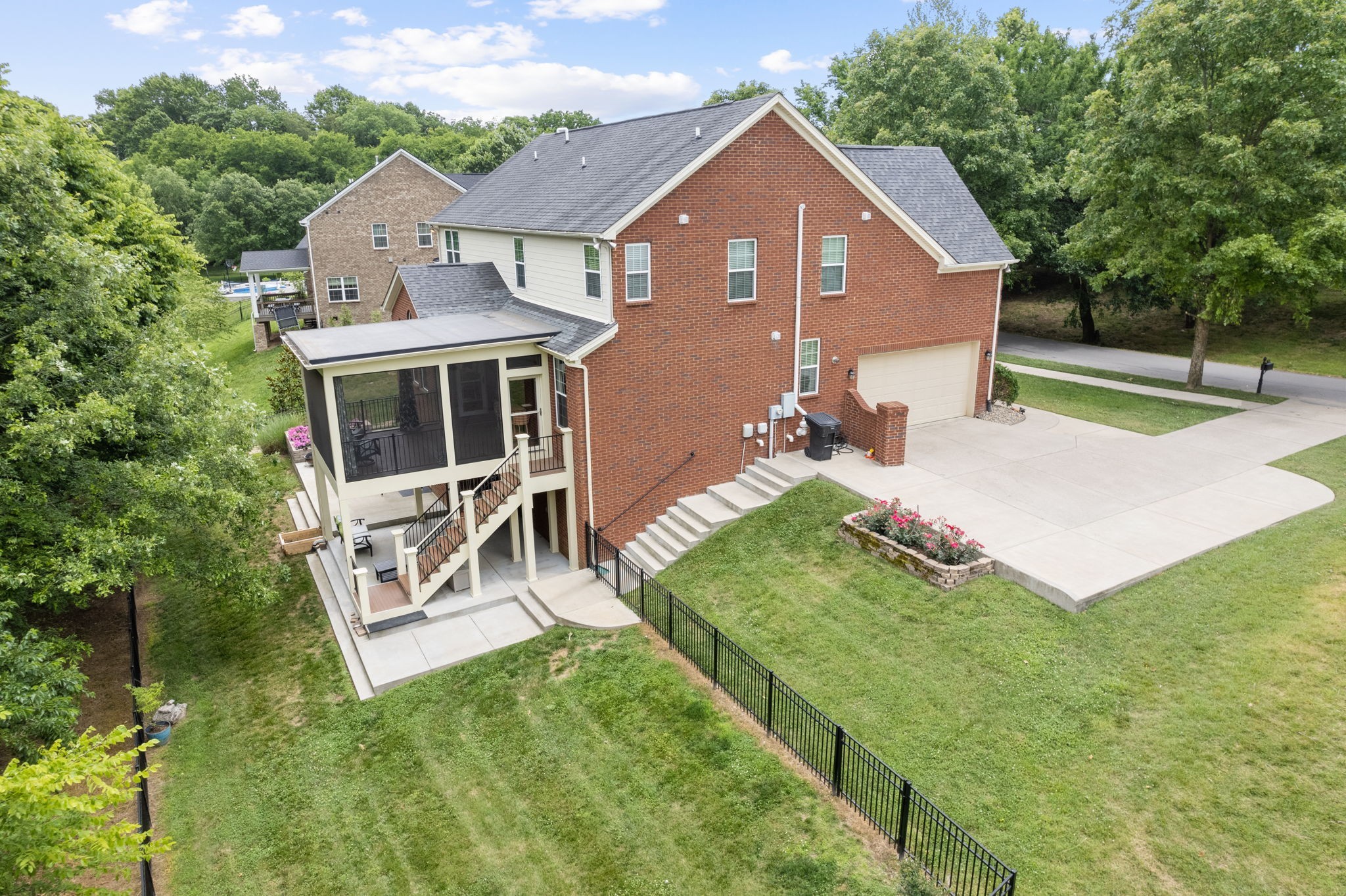121 Stream Valley Boulevard Franklin, TN 37064 - Photo 46 of 60 a view of a house with a yard porch and sitting area