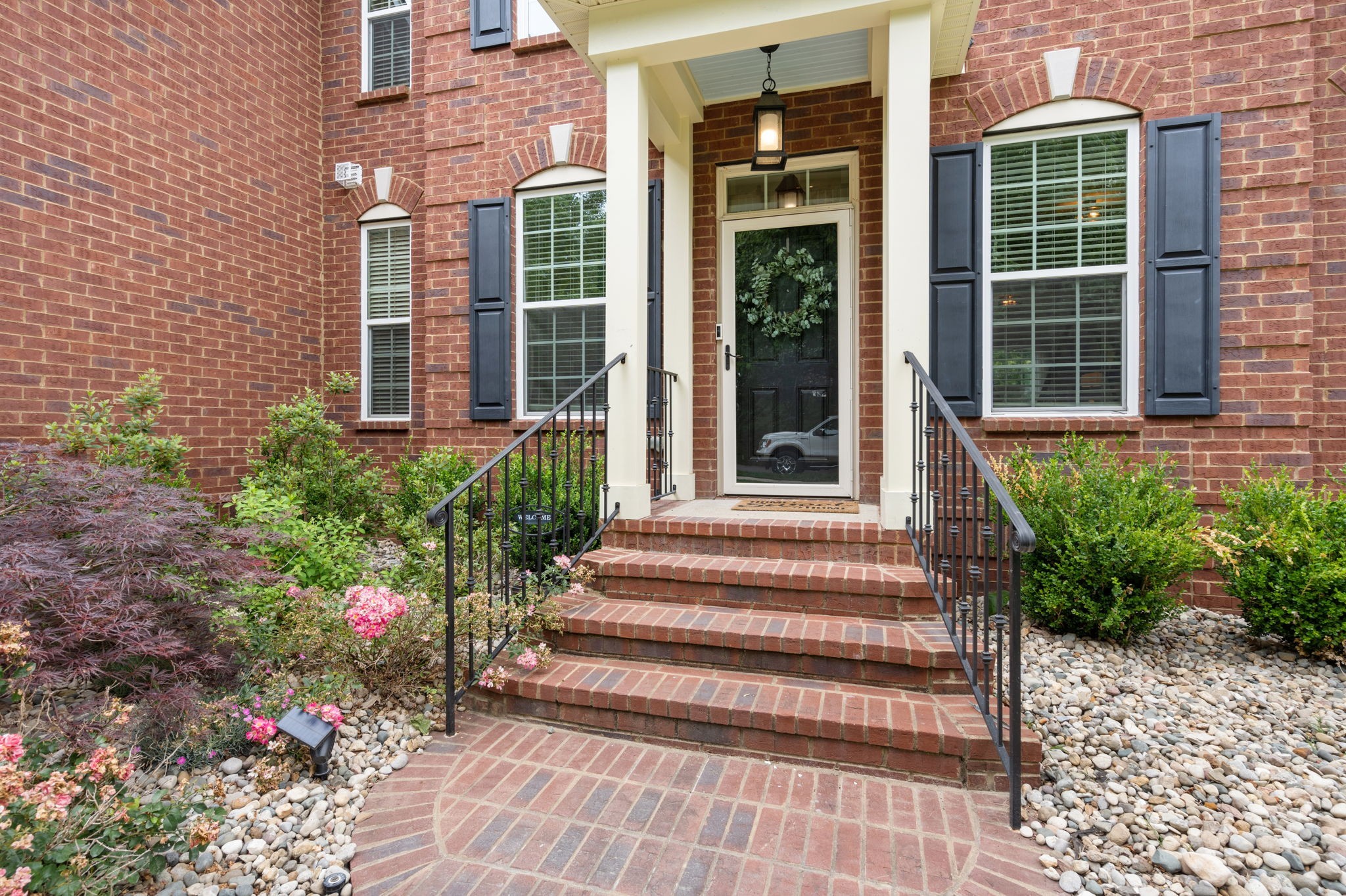 121 Stream Valley Boulevard Franklin, TN 37064 - Photo 5 of 60 a view of a house with potted plants