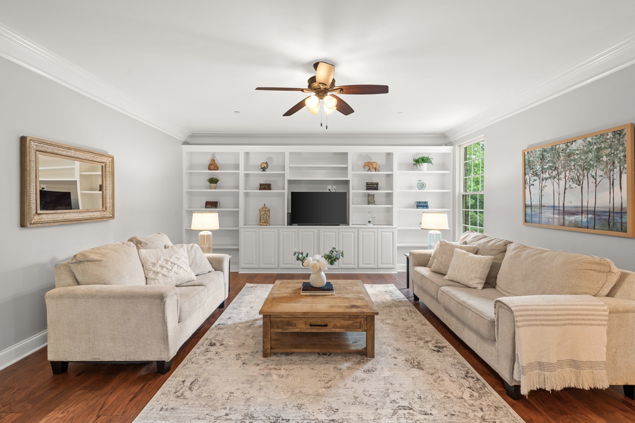 121 Stream Valley Boulevard Franklin, TN 37064 - Photo 10 of 60 a living room with furniture ceiling fan and a rug