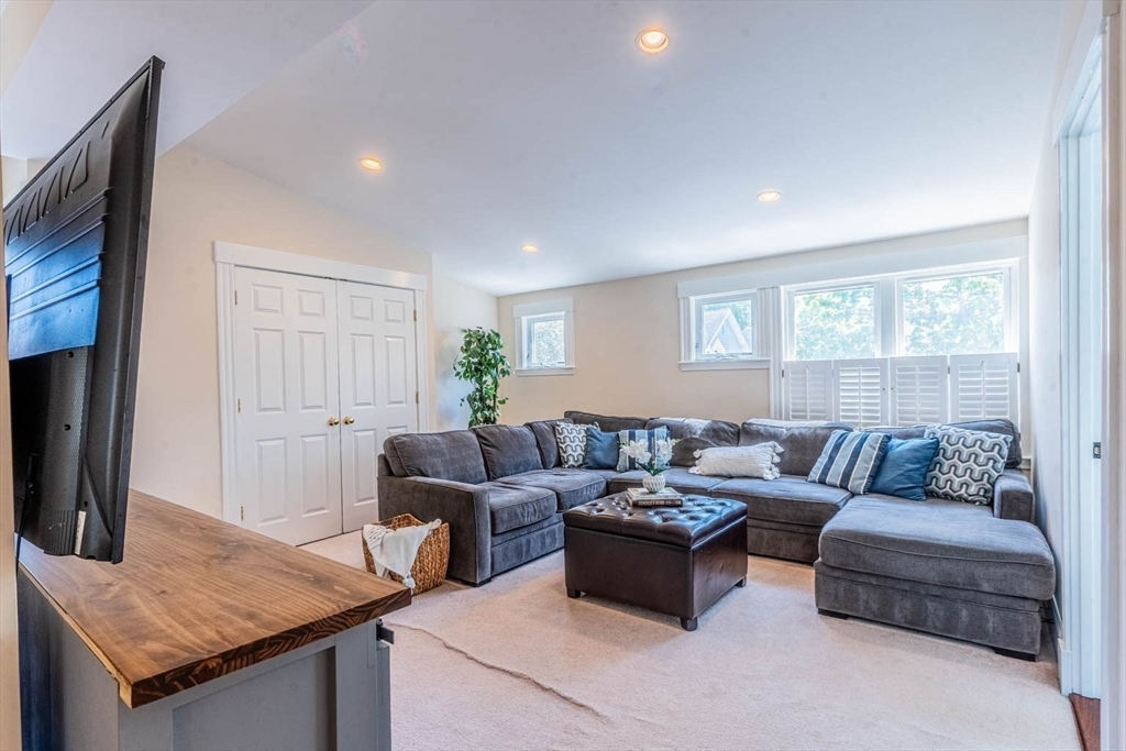 51 Edwin Road Waltham, MA 02453 - Photo 17 of 35 a living room with furniture and a window