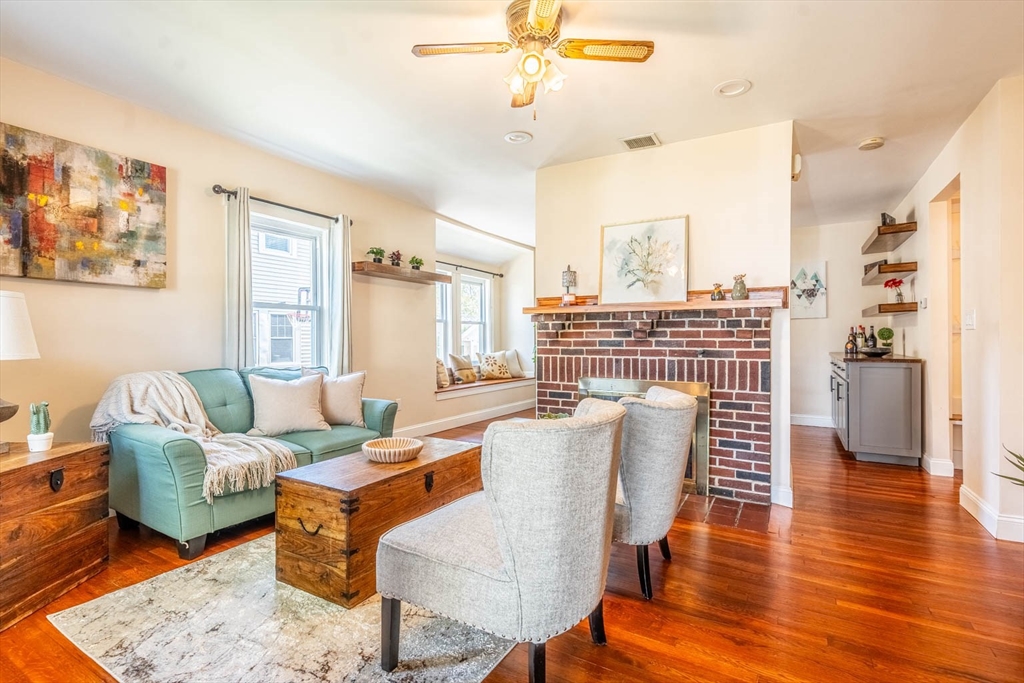 51 Edwin Road Waltham, MA 02453 - Photo 2 of 35 a living room with furniture and wooden floor