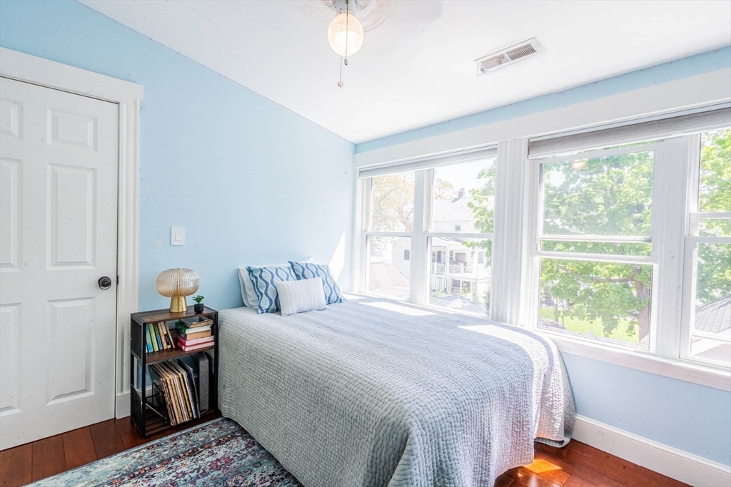 51 Edwin Road Waltham, MA 02453 - Photo 21 of 35 a bedroom with a bed and a window