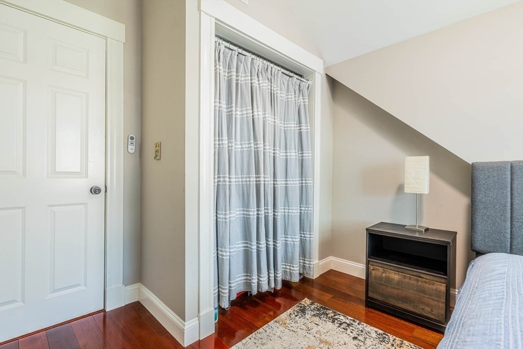 51 Edwin Road Waltham, MA 02453 - Photo 23 of 35 a view of a livingroom with furniture and staircase