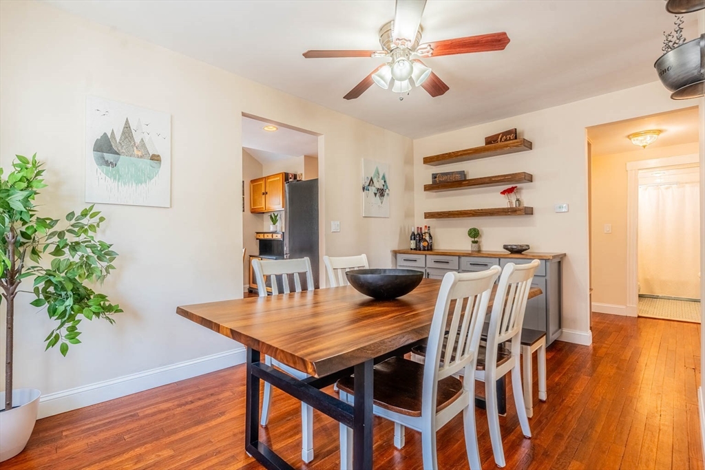 51 Edwin Road Waltham, MA 02453 - Photo 6 of 35 a view of a dining room with furniture and wooden floor