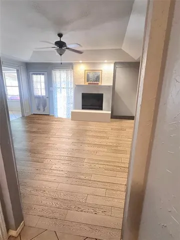 a view of an empty room and window