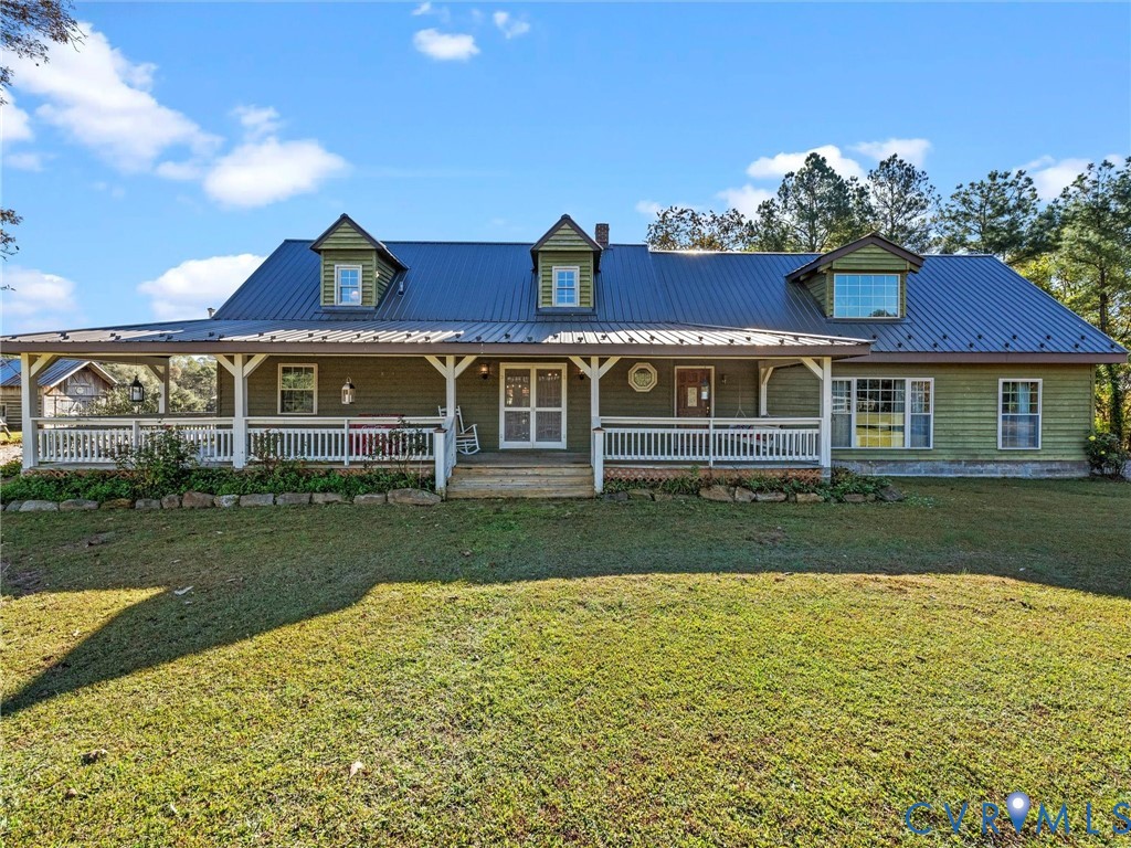 1024 Back Mountain Road Dillwyn, VA 23936 - Photo 2 of 70 a front view of a house with a yard