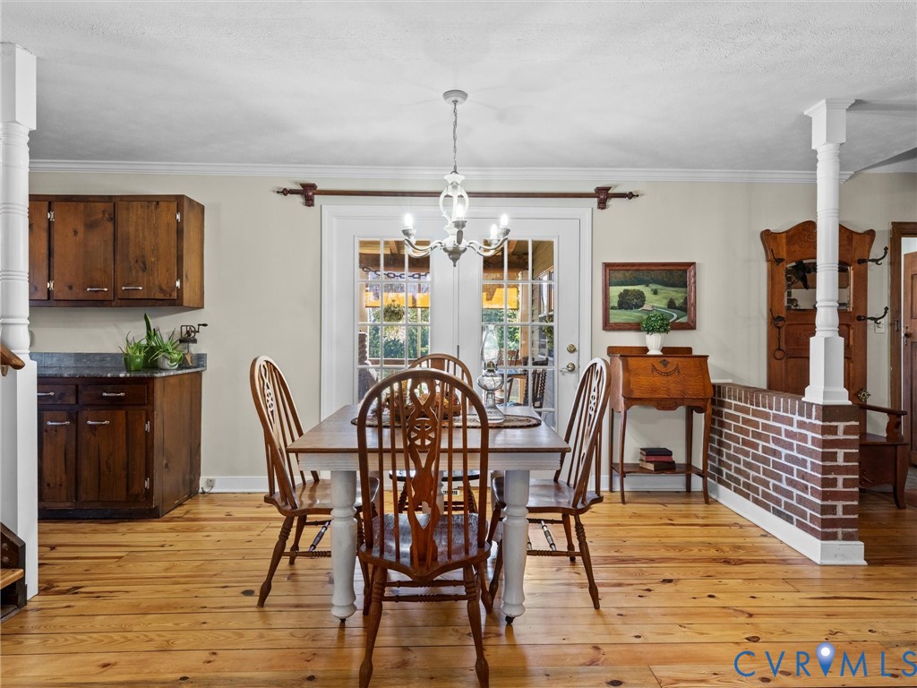 1024 Back Mountain Road Dillwyn, VA 23936 - Photo 24 of 70 a view of a dining room with furniture window and wooden floor