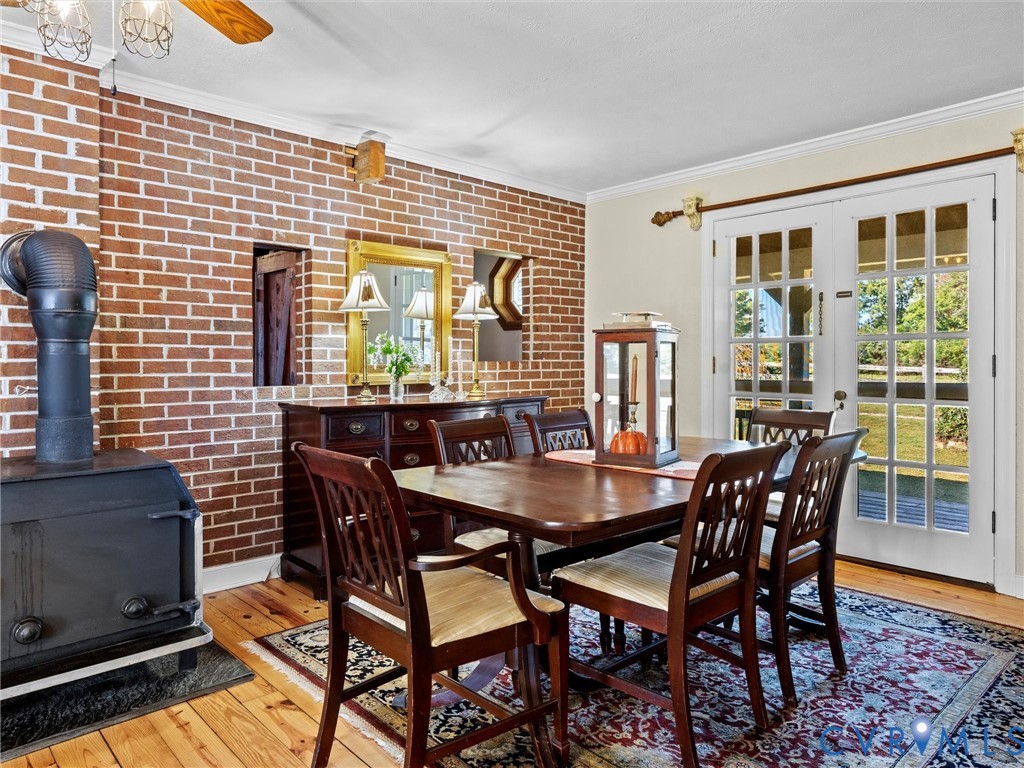 1024 Back Mountain Road Dillwyn, VA 23936 - Photo 28 of 70 a view of a dining room with furniture and wooden floor