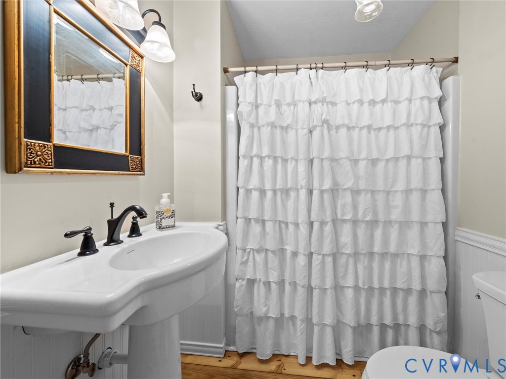 1024 Back Mountain Road Dillwyn, VA 23936 - Photo 39 of 70 a bathroom with a sink and a mirror