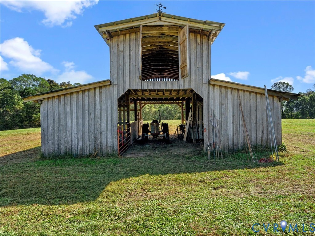 1024 Back Mountain Road Dillwyn, VA 23936 - Photo 47 of 70 a view of a house with a yard