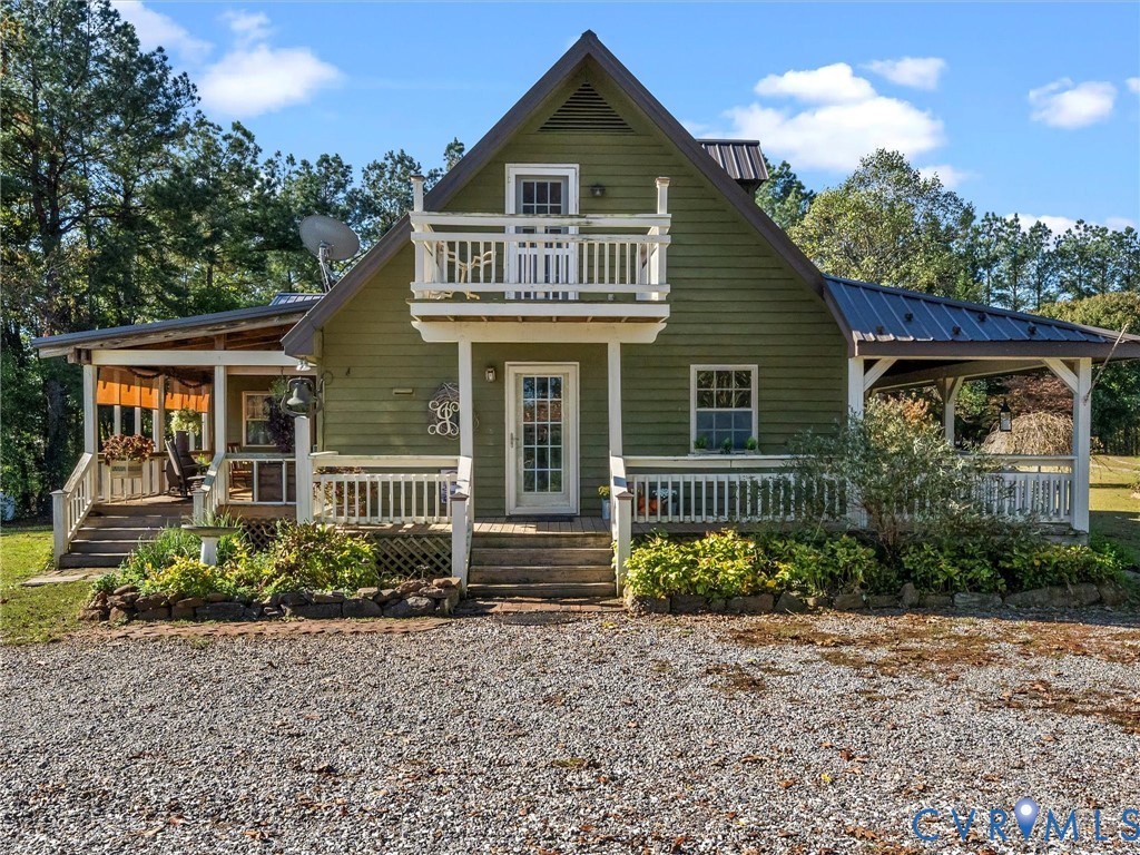 1024 Back Mountain Road Dillwyn, VA 23936 - Photo 52 of 70 a front view of a house with garden