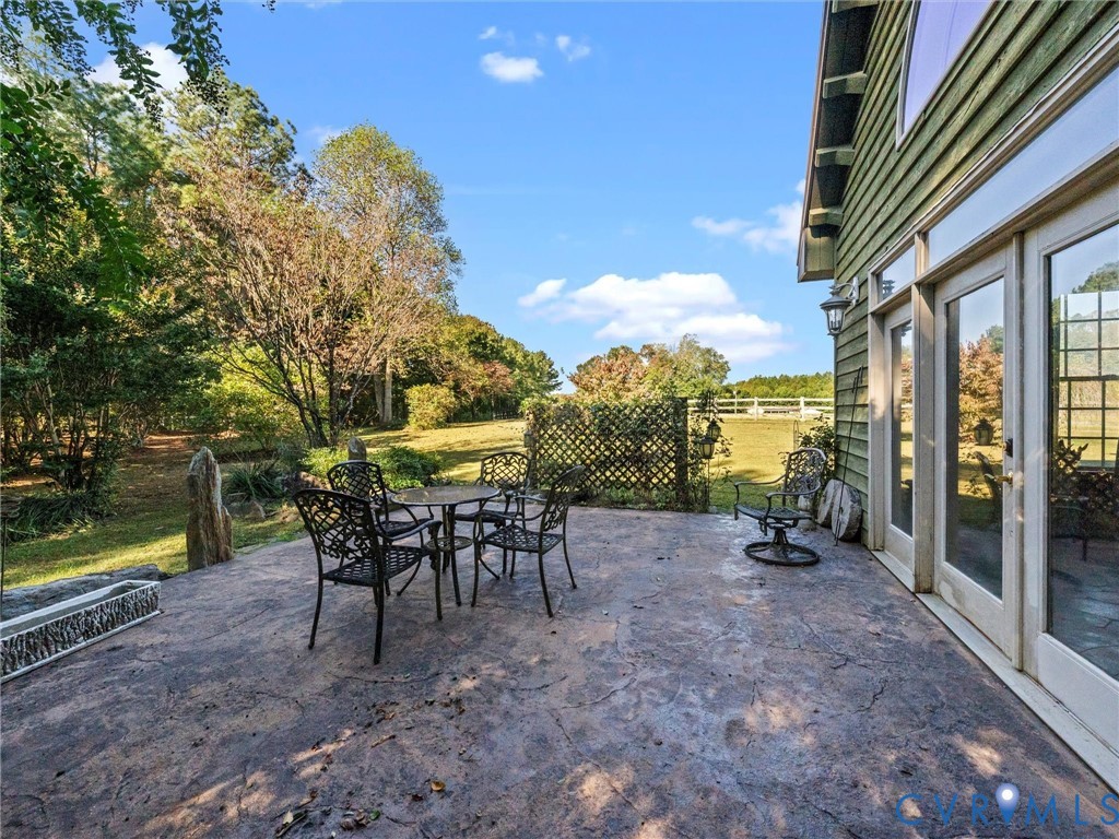 1024 Back Mountain Road Dillwyn, VA 23936 - Photo 63 of 70 a view of a porch with chairs and table