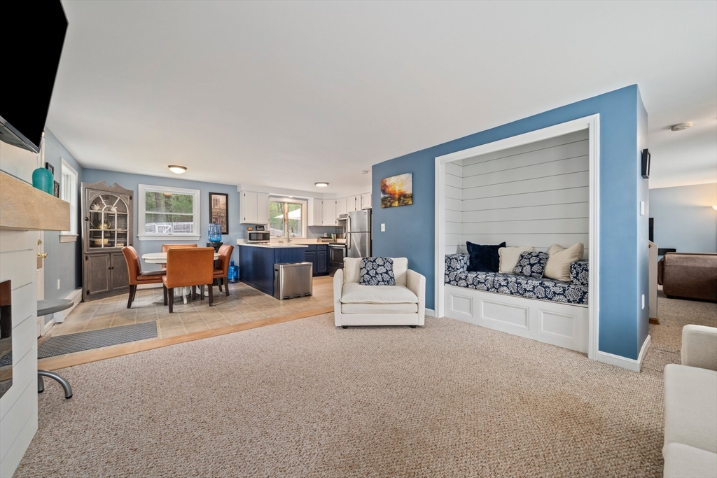 80 King Street Hanover, MA 02339 - Photo 11 of 34 a living room with furniture and a fireplace