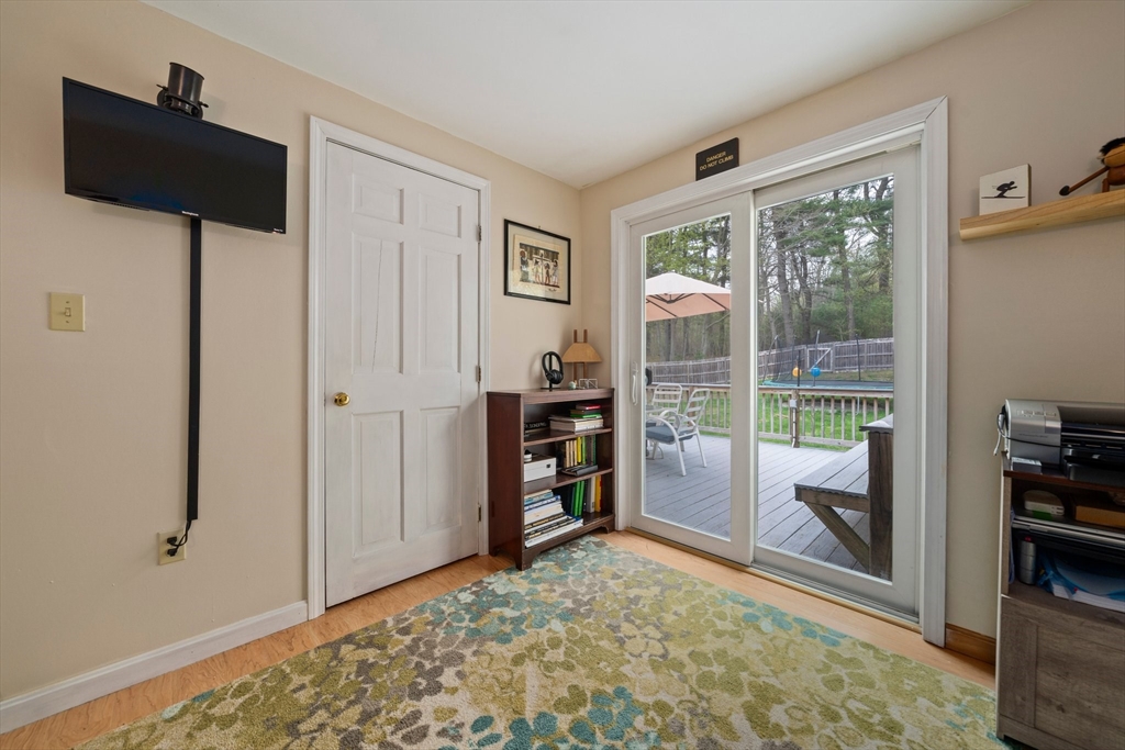 80 King Street Hanover, MA 02339 - Photo 16 of 34 a living room with furniture and a flat screen tv