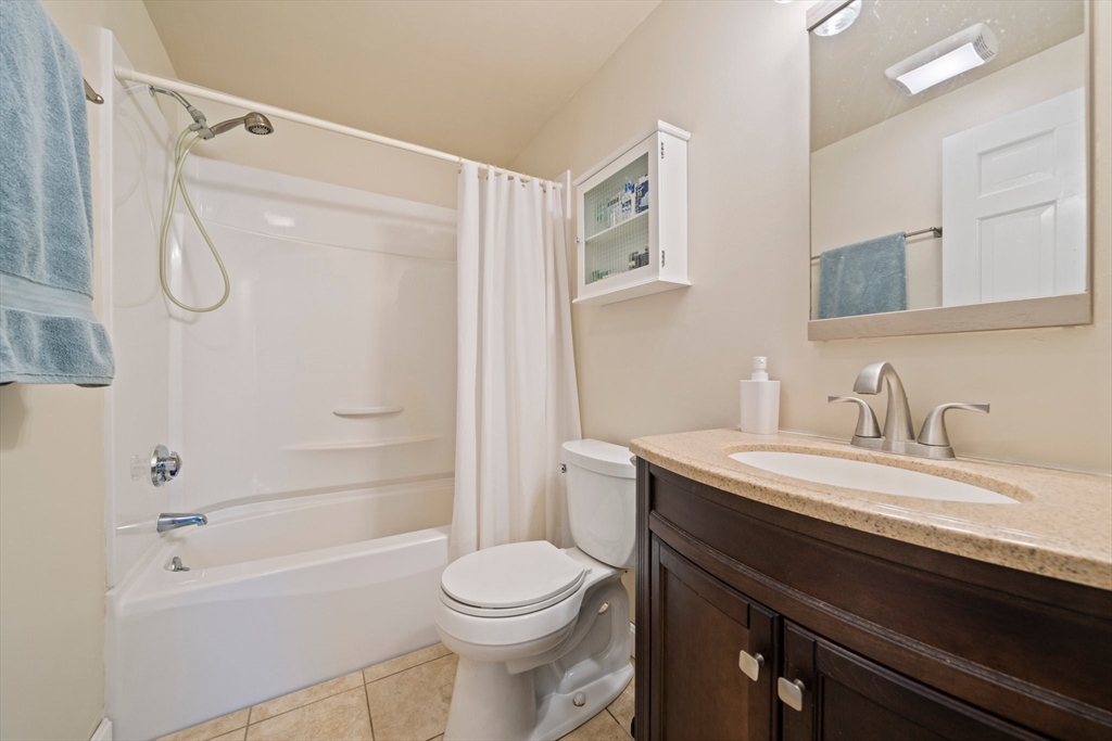80 King Street Hanover, MA 02339 - Photo 17 of 34 a bathroom with a sink a toilet and a bathtub
