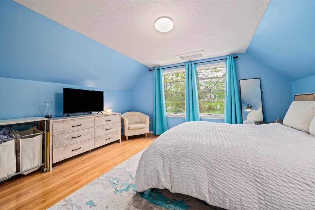 80 King Street Hanover, MA 02339 - Photo 20 of 34 a bedroom with a bed and flat screen tv