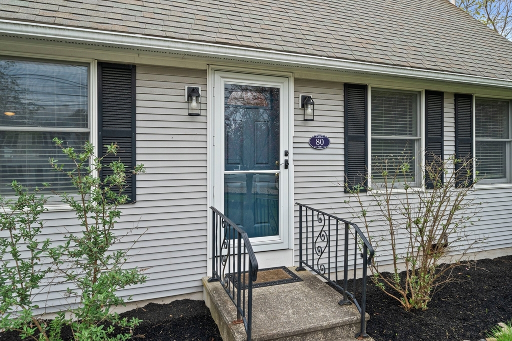 80 King Street Hanover, MA 02339 - Photo 3 of 34 a front view of a house with a porch