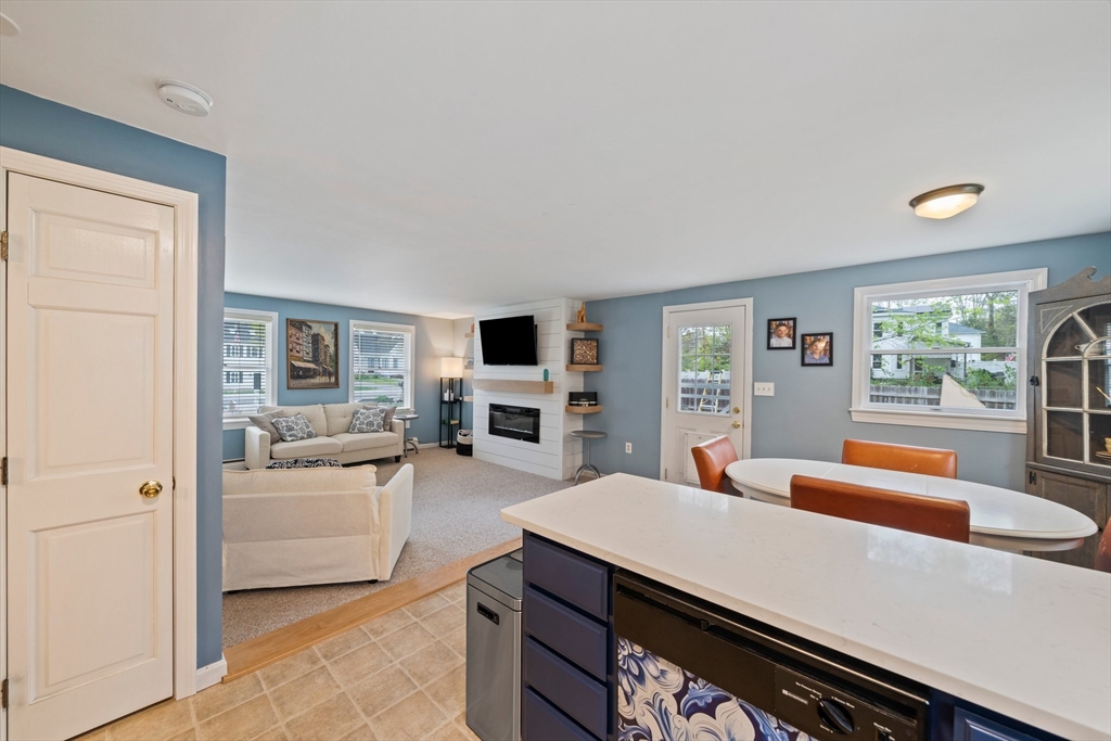 80 King Street Hanover, MA 02339 - Photo 6 of 34 a living room with furniture and a flat screen tv