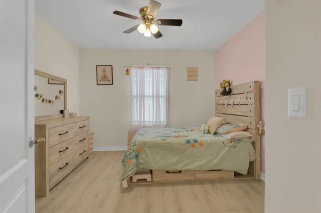 a bedroom with a bed and furniture