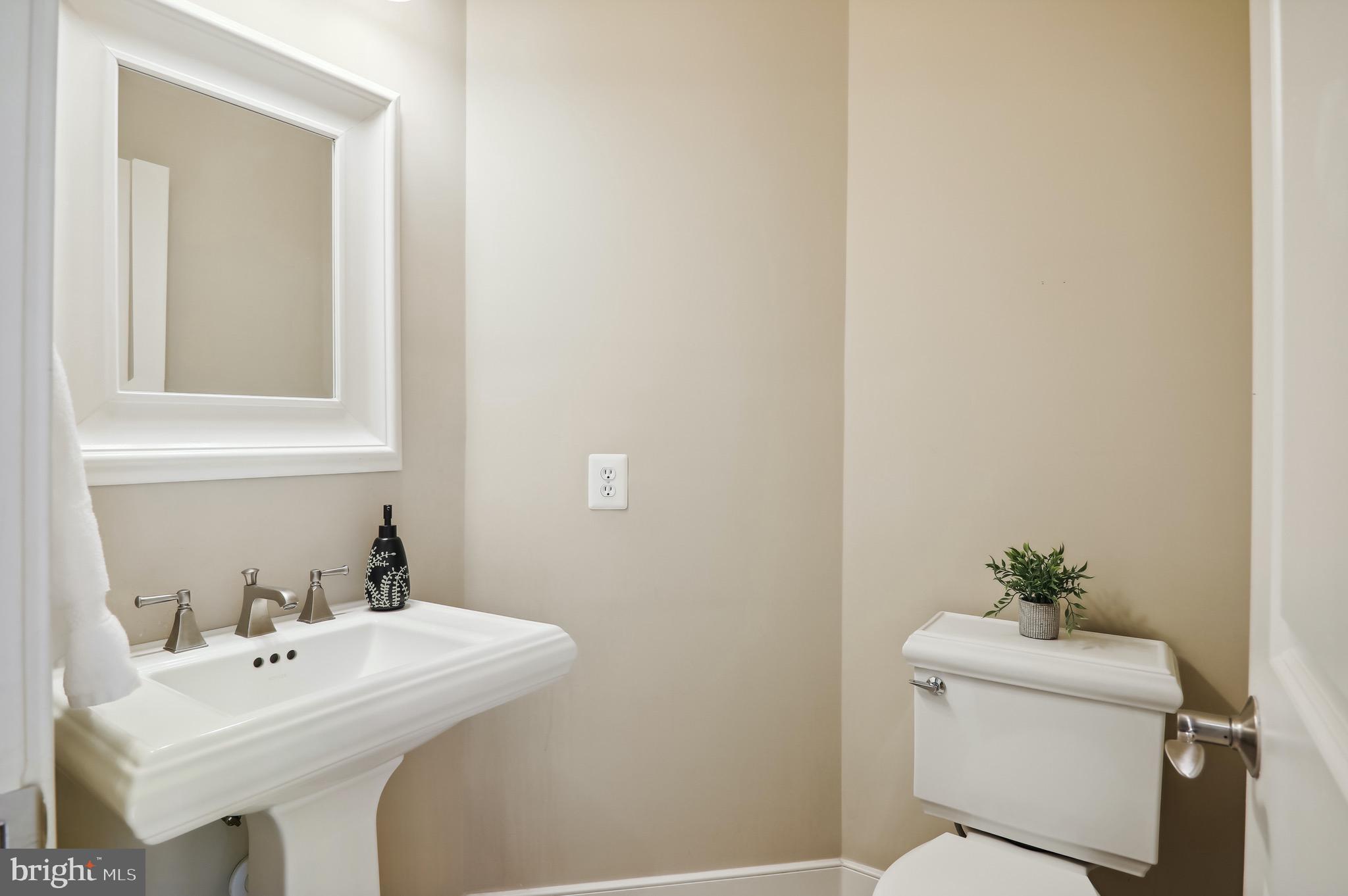 9504 Ament Street Silver Spring, MD 20910 - Photo 9 of 25 Main level powder room