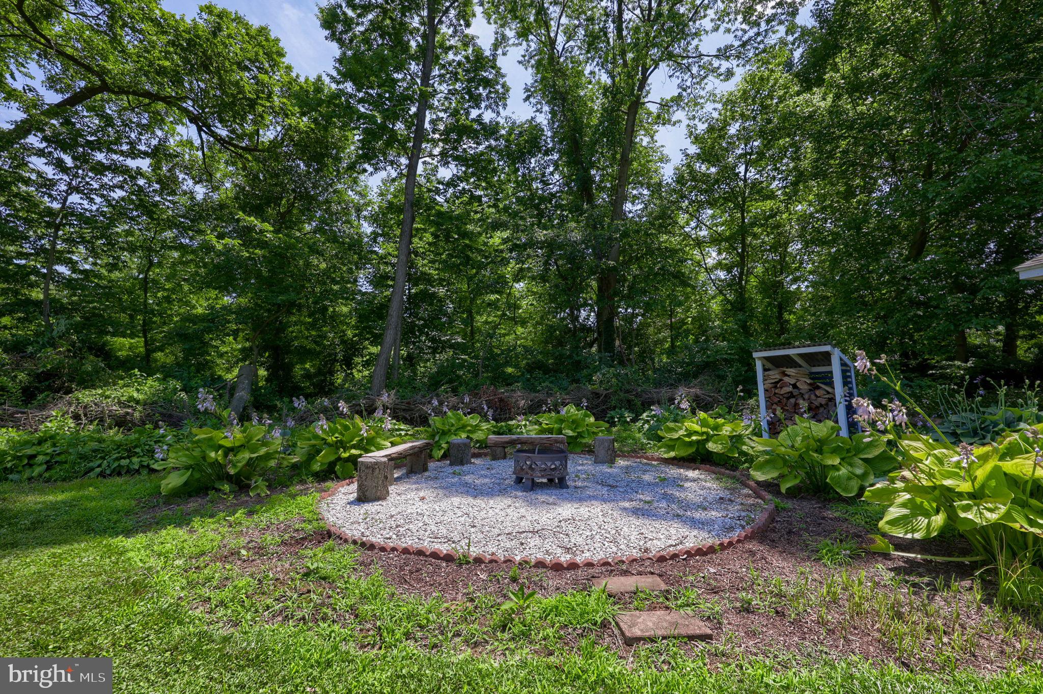 3356 Turnpike Road Elizabethtown, PA 17022 - Photo 47 of 52 Serene garden fire pit retreat.