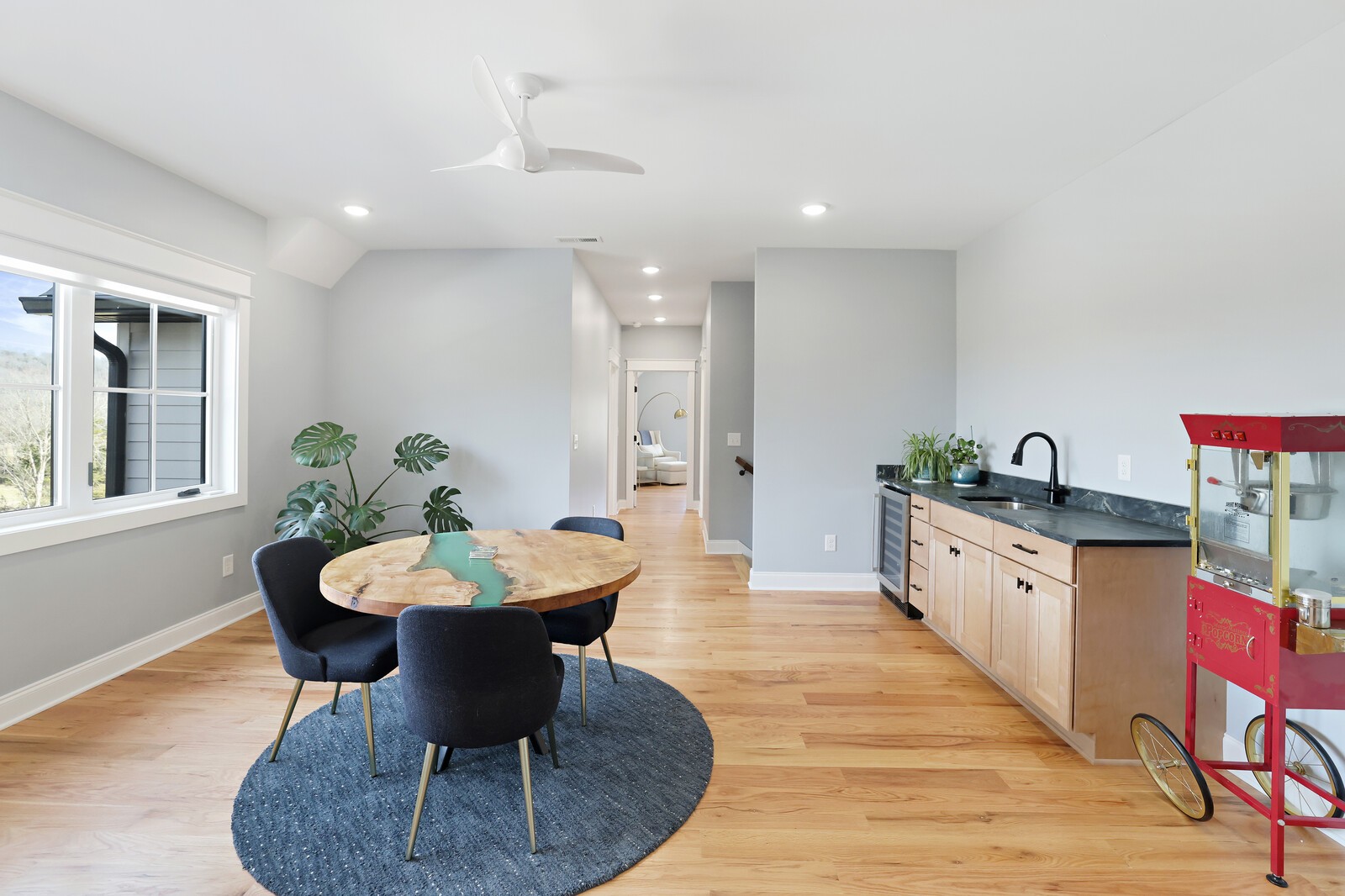 3755 Holmes Gap Road Watertown, TN 37184 - Photo 29 of 71 a kitchen with stainless steel appliances kitchen island granite countertop a sink a stove a dining table and chairs