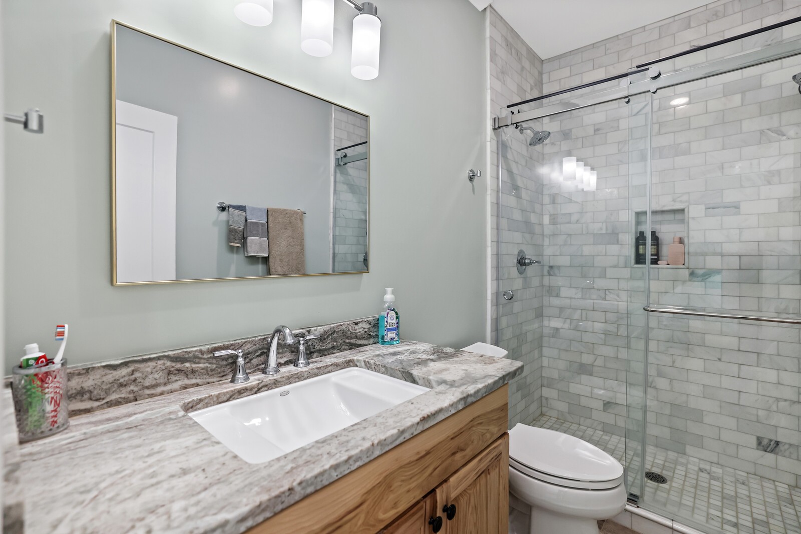 3755 Holmes Gap Road Watertown, TN 37184 - Photo 50 of 71 a bathroom with a granite countertop sink toilet and shower
