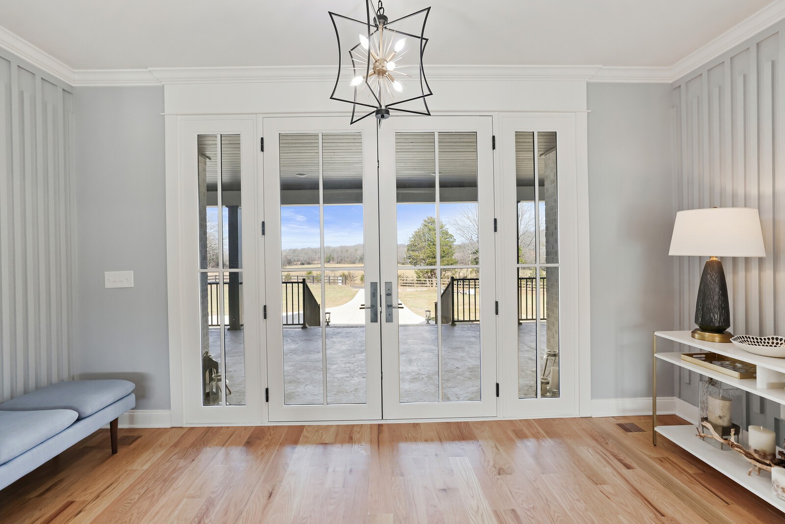 3755 Holmes Gap Road Watertown, TN 37184 - Photo 5 of 71 a view of a hallway with wooden floor and a bathroom