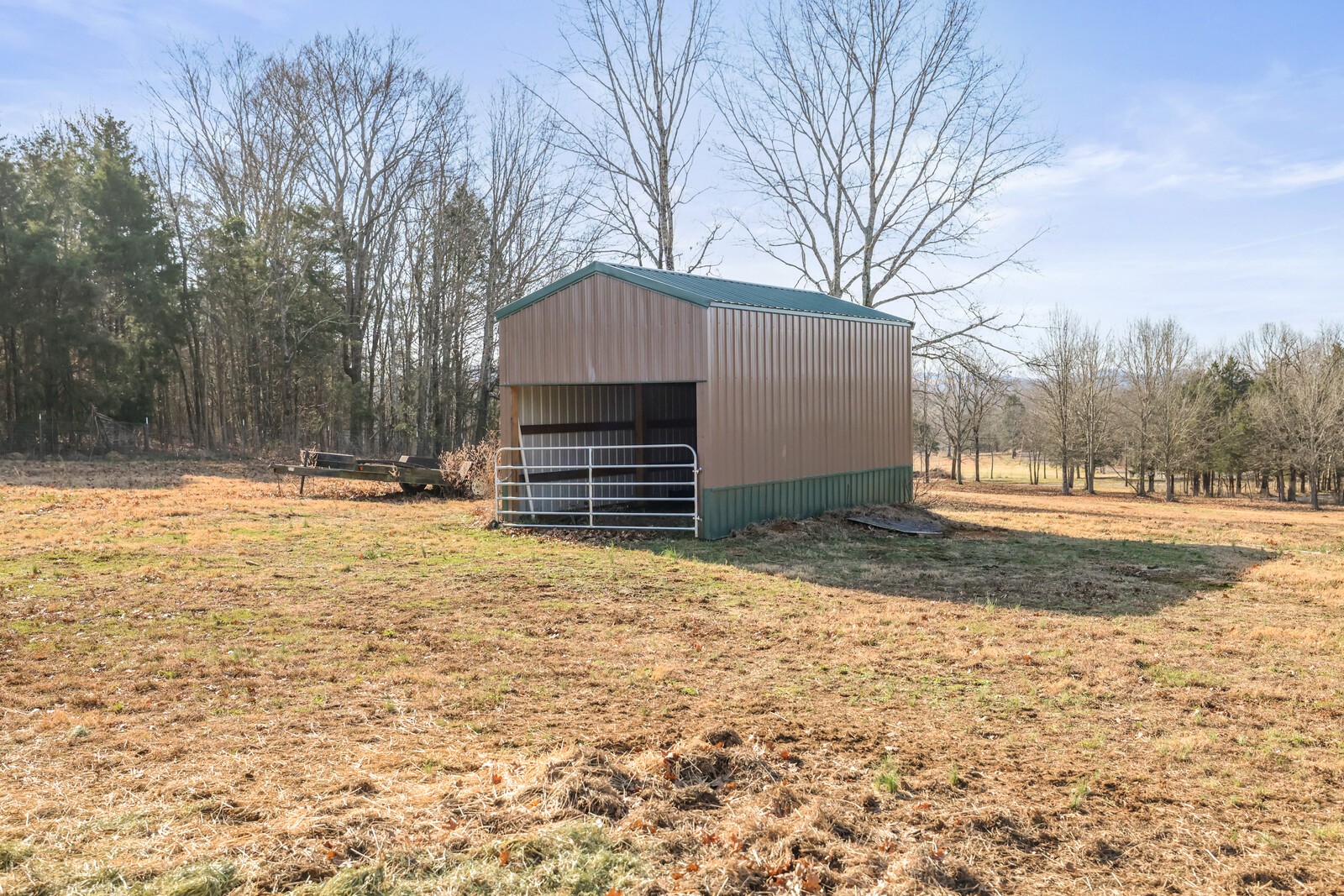 3755 Holmes Gap Road Watertown, TN 37184 - Photo 68 of 71 a front view of a house with a yard covered with snow