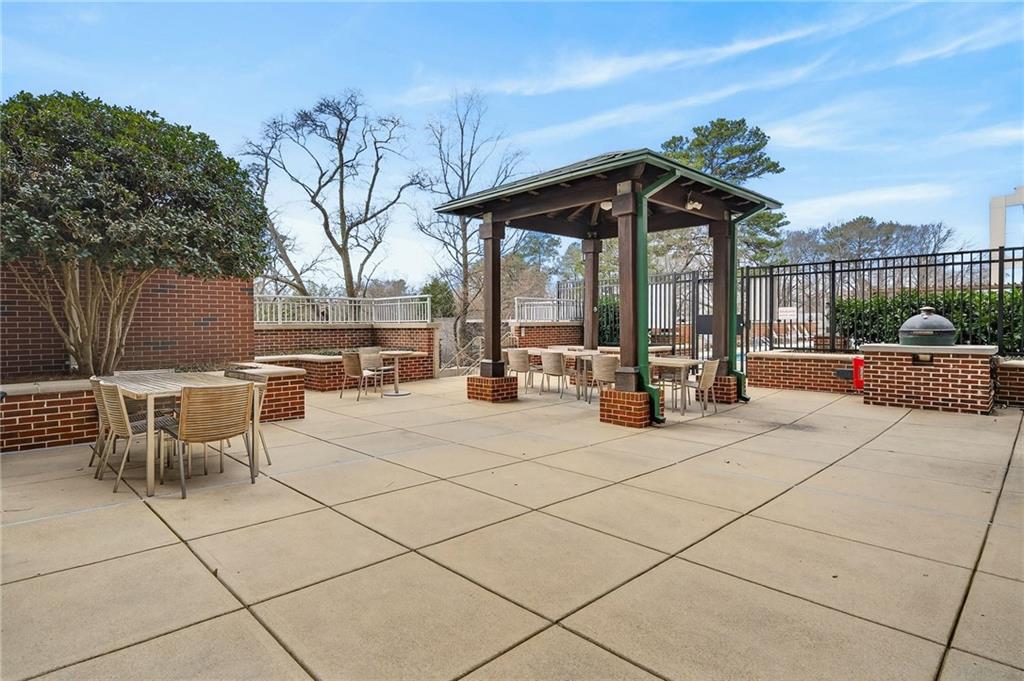 1820 Peachtree Road Northwest, Unit 312 Atlanta, GA 30309 - Photo 34 of 51 a view of outdoor space and patio