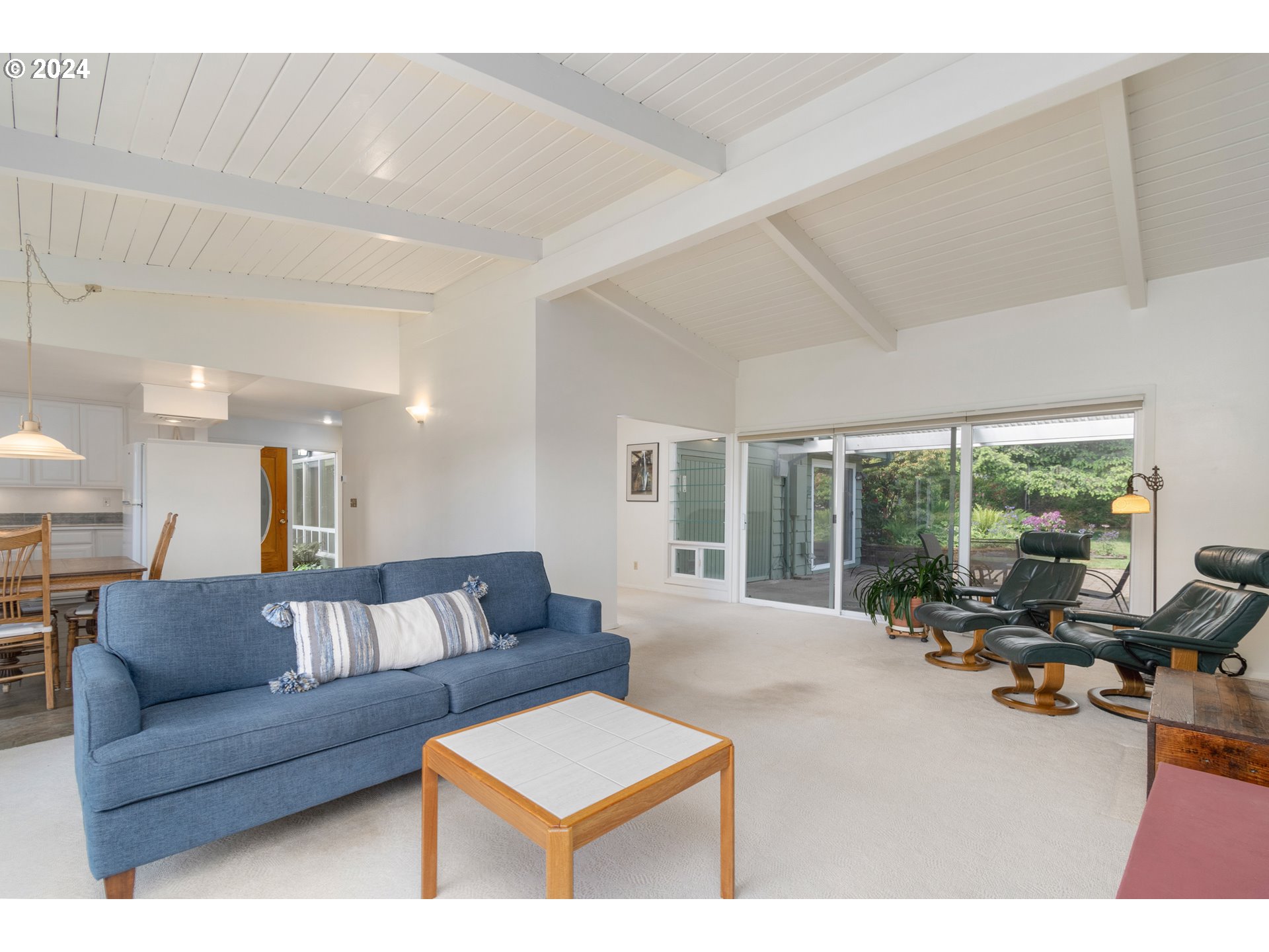 3430 View Lane Eugene, OR 97405 - Photo 12 of 48 a living room with furniture and a large window