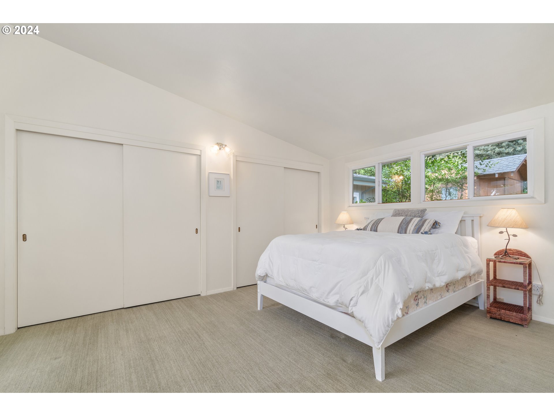 3430 View Lane Eugene, OR 97405 - Photo 16 of 48 a bedroom with a bed and a night stand