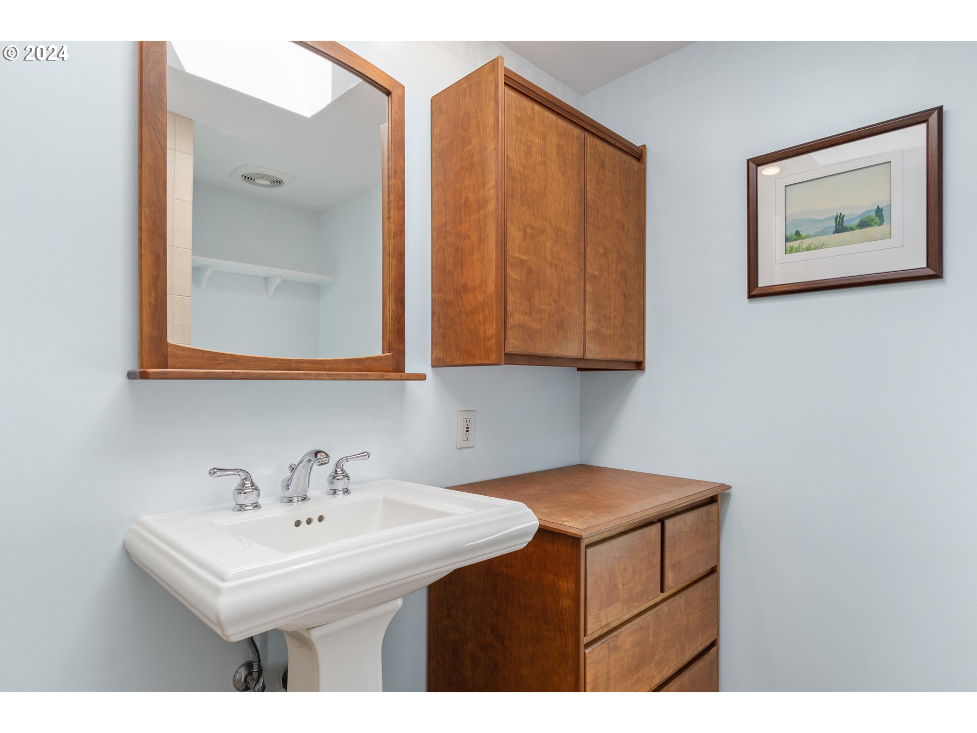 3430 View Lane Eugene, OR 97405 - Photo 20 of 48 a bathroom with a sink and a mirror