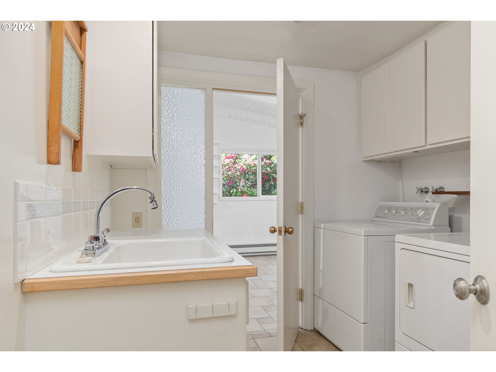 3430 View Lane Eugene, OR 97405 - Photo 21 of 48 a bathroom with a sink and a mirror