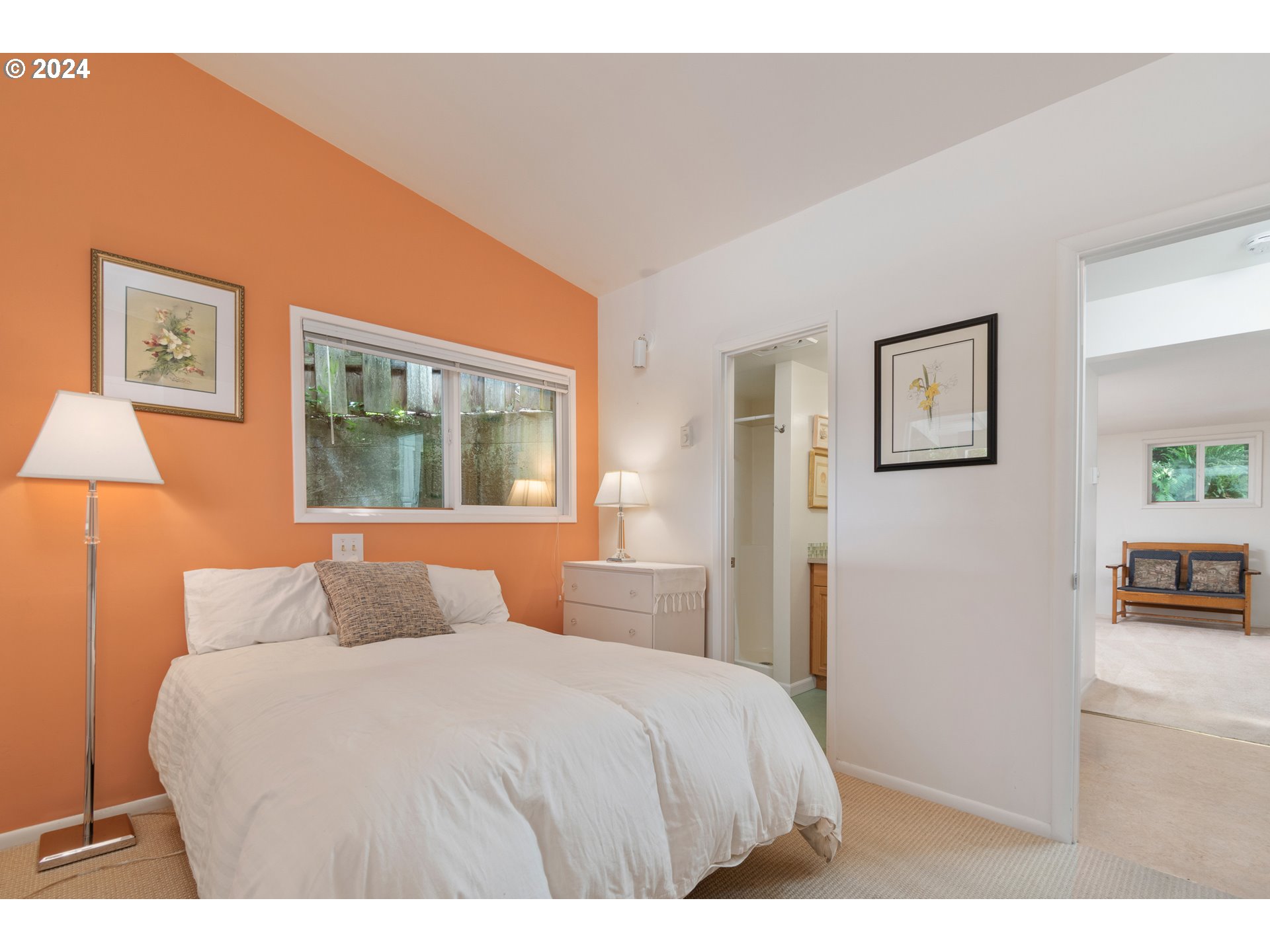 3430 View Lane Eugene, OR 97405 - Photo 25 of 48 a bedroom with a large bed and a lamp