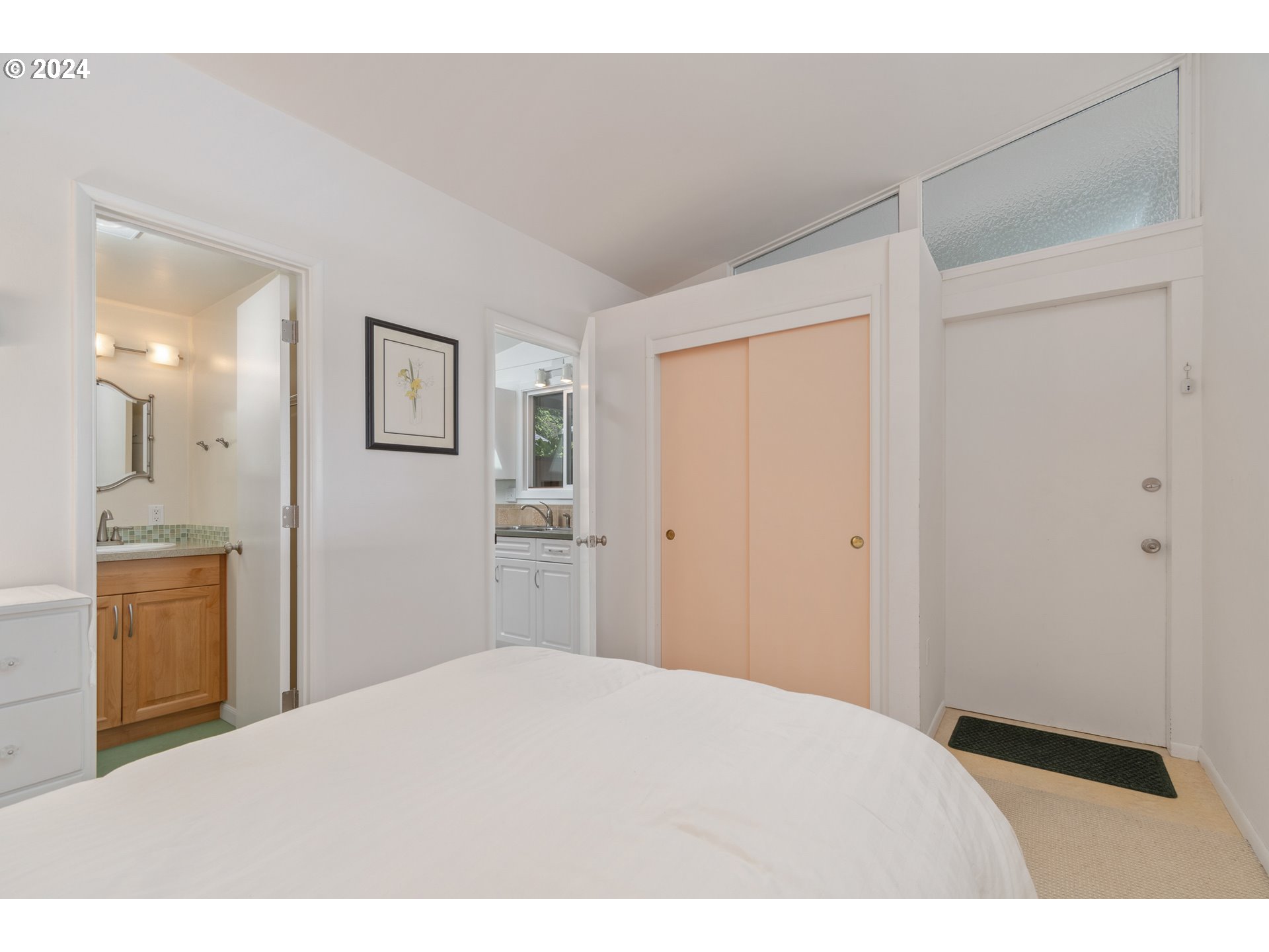 3430 View Lane Eugene, OR 97405 - Photo 26 of 48 a bedroom with a bed and a mirror