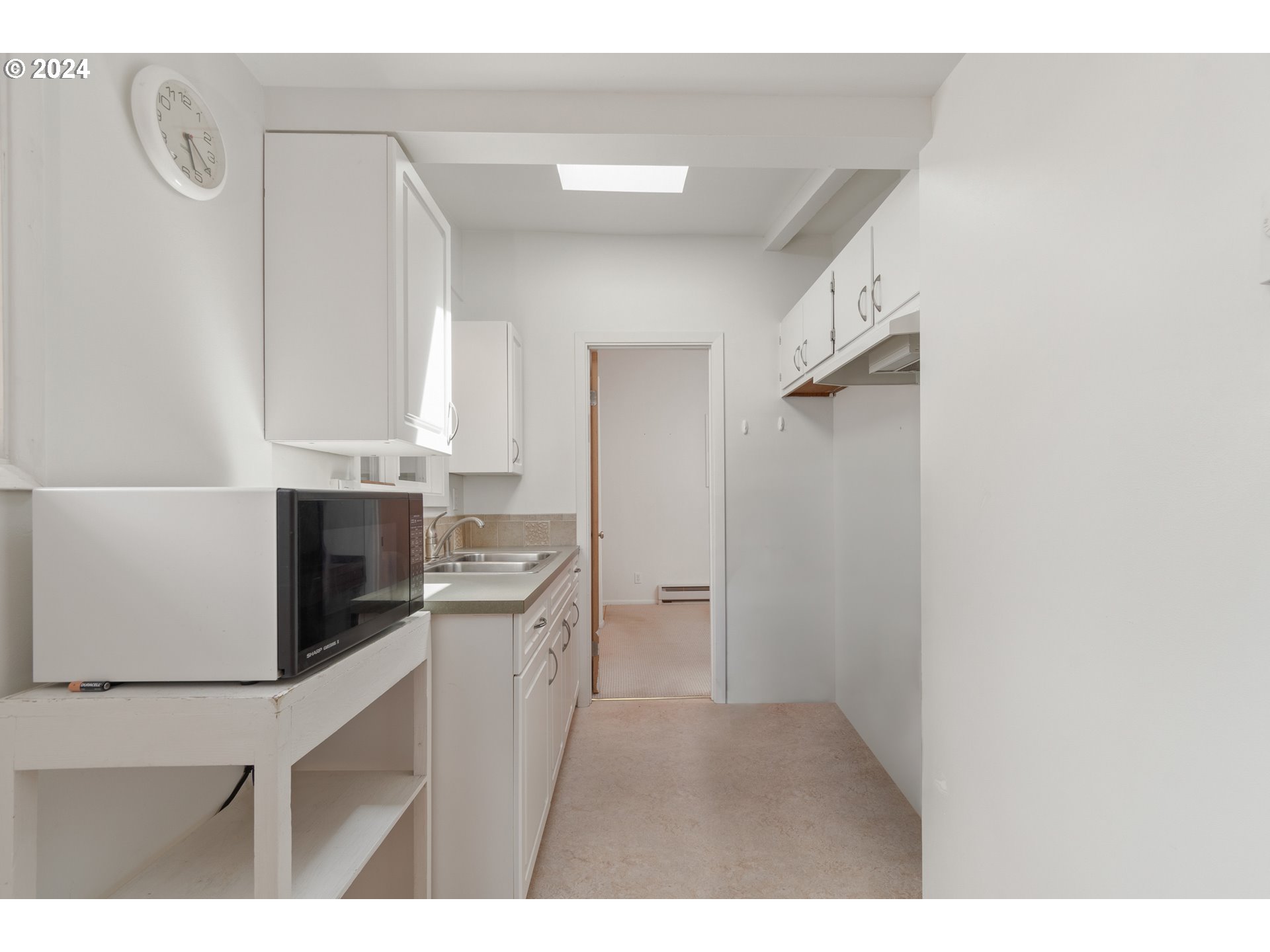 3430 View Lane Eugene, OR 97405 - Photo 29 of 48 a kitchen with a refrigerator and a stove